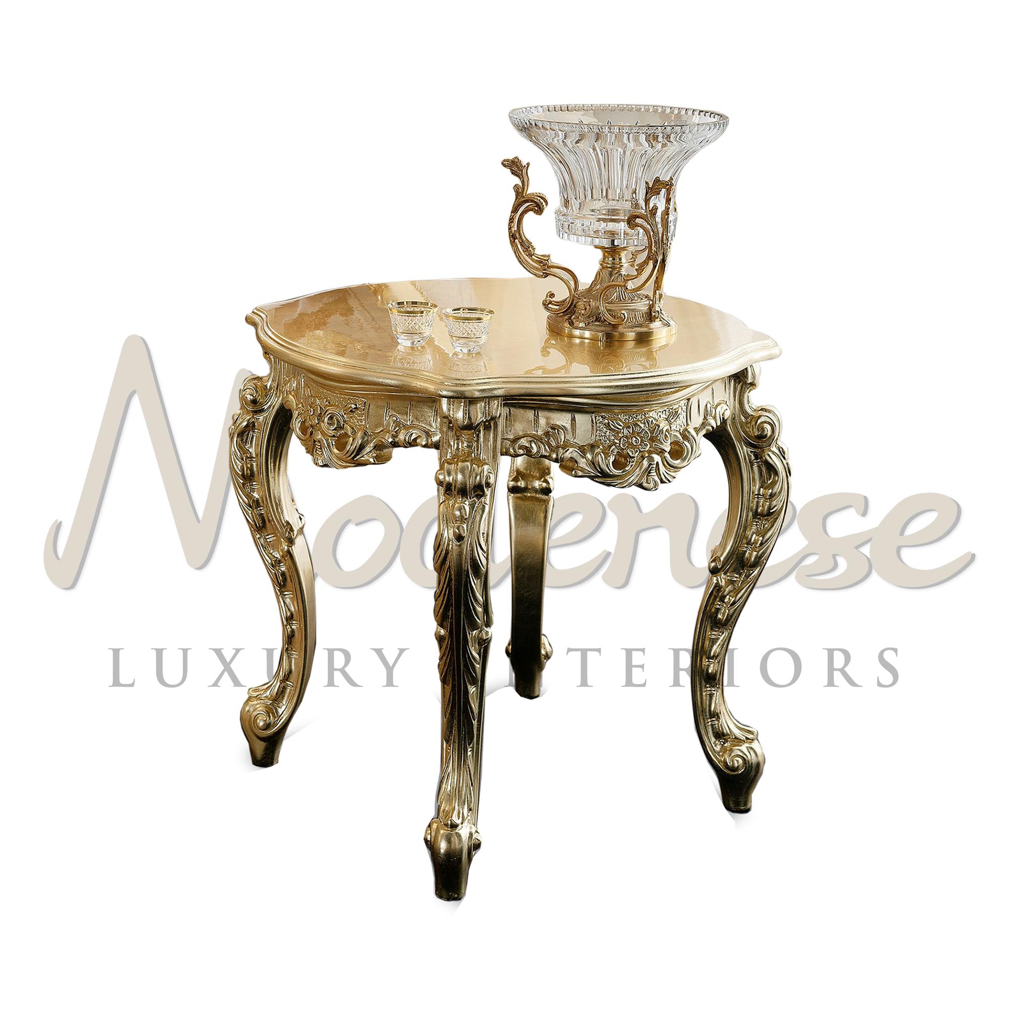 A classical italian luxury side table, ideal in mesmerizing sets of pure gold-leaf patinated furnishing such as center and coffee tables, or more generally with gold-leaf decorated furniture. This small side table places best beside an elegant