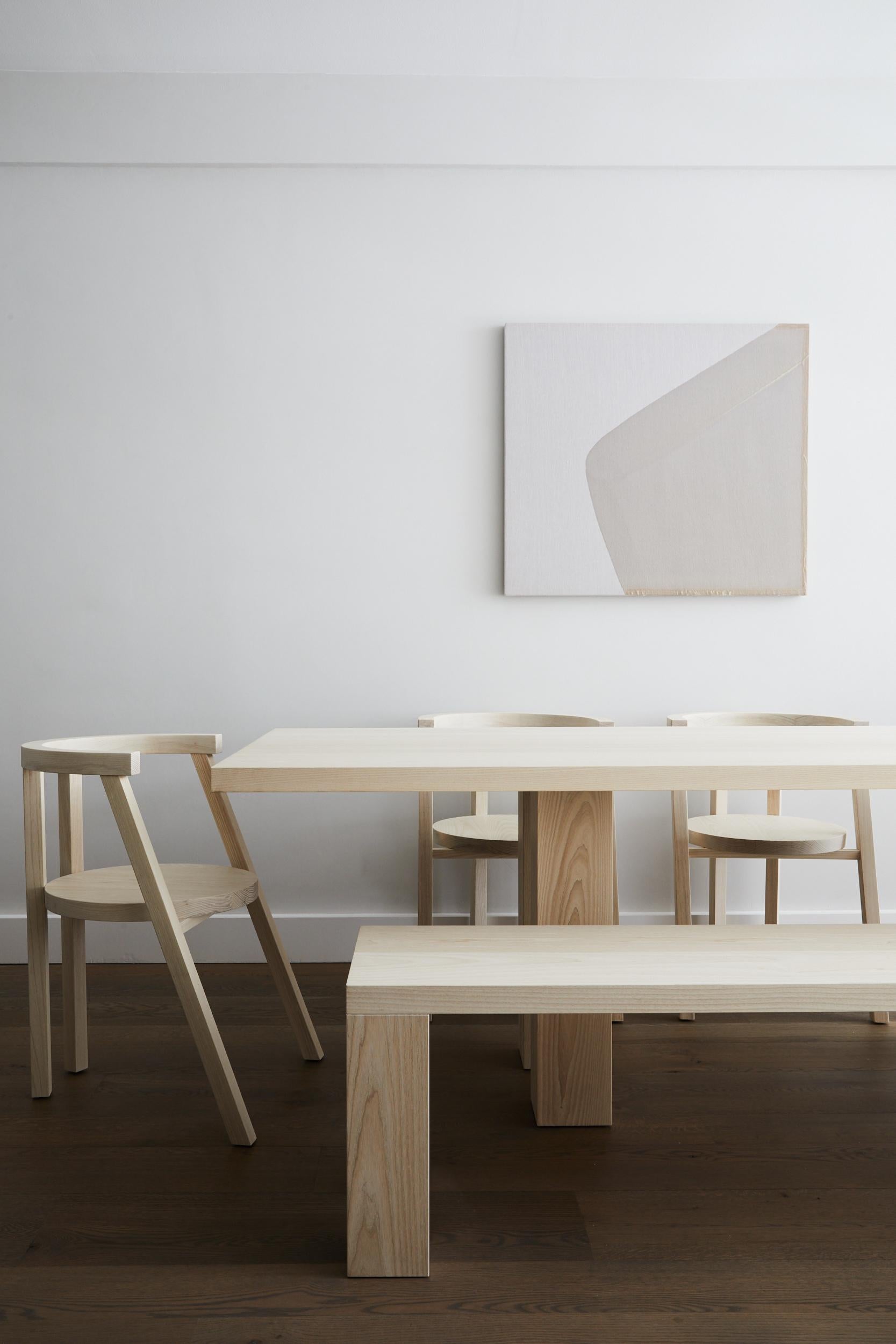 This piece quietly challenges the archetype of a bench with the unexpected proportion of the legs and hidden detailing. A single plane effortlessly floats across the legs. A continuation of the Nº 101 Dining Table.

Beautifully crafted with high