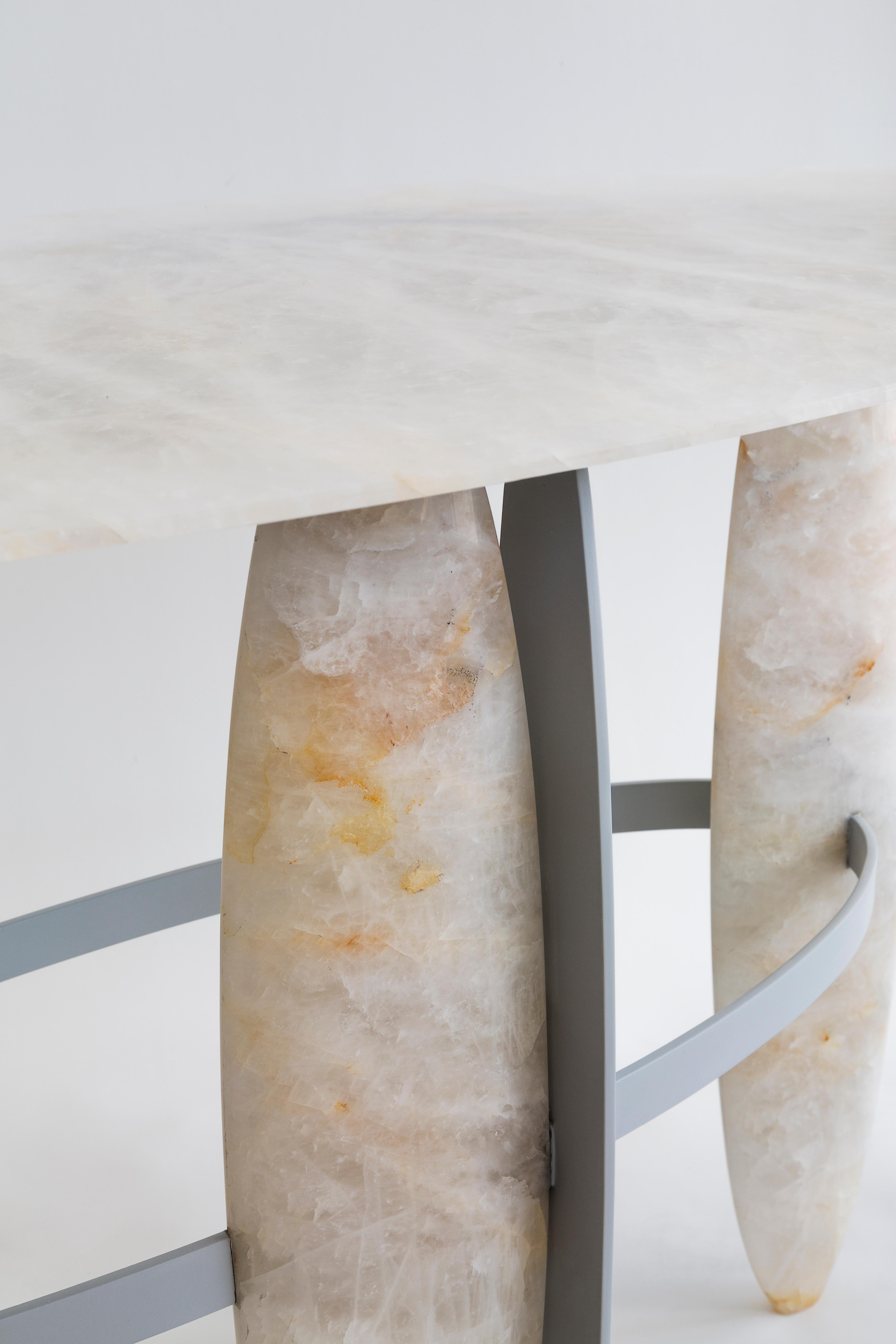 The Pablina hand carved quartz stone console was created by the designer Leo Di Caprio after a research on the hidden Brazilian underground diversity: the stones. 

It is made of the Brazilian pure quartz stone, a stone with an incredible luminosity