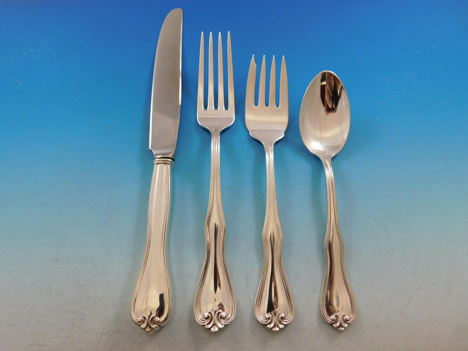 Rare Puritan by Frank Whiting, circa 1905, sterling silver flatware set, 74 pieces. This set includes:
12 Knives, 8 5/8