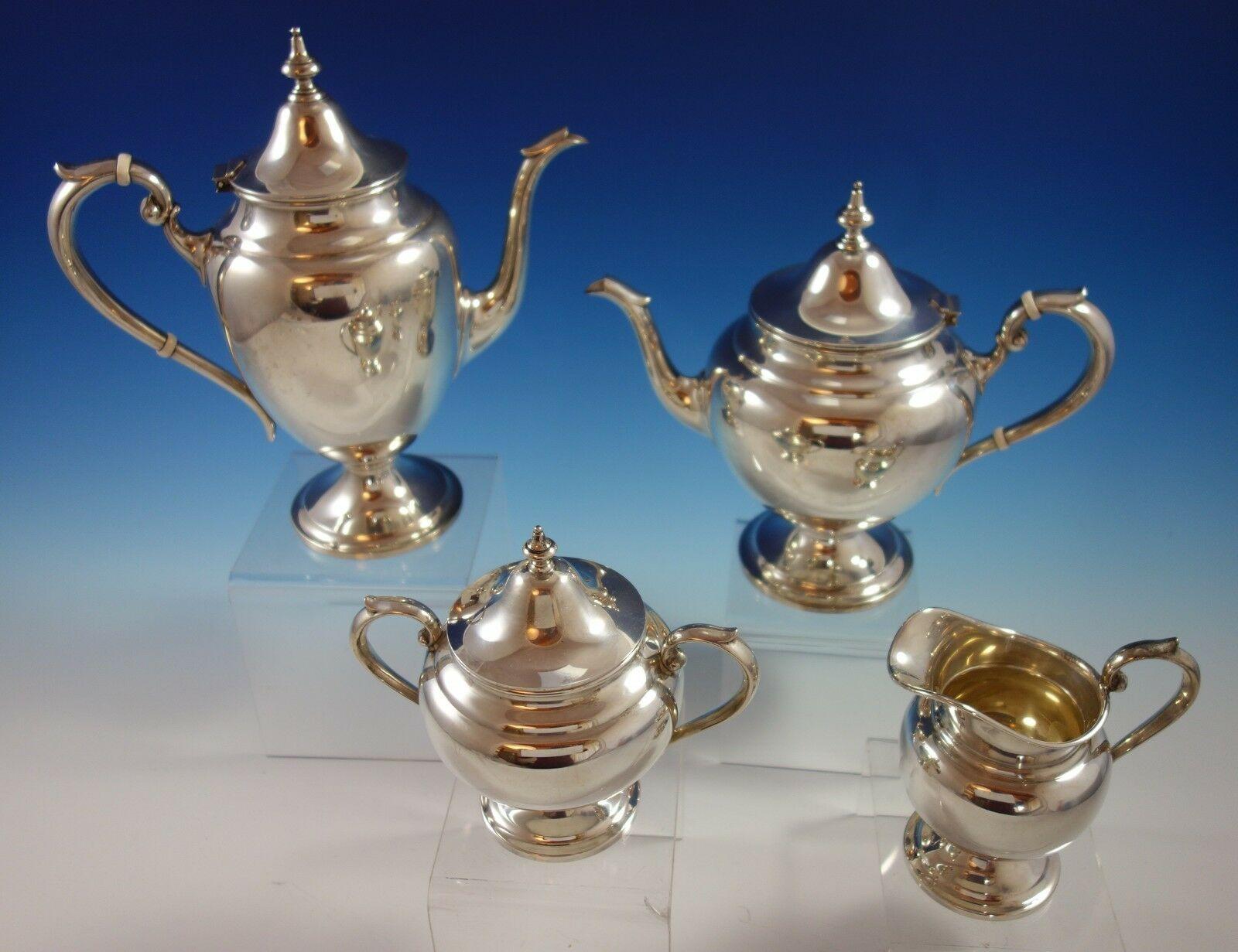 Puritan by Gorham

Gorgeous Puritan by Gorham sterling silver 4-piece tea set. The set includes:

1 - Coffee pot: Marked #451, holds 2 3/4 pints, measures: 9 3/4