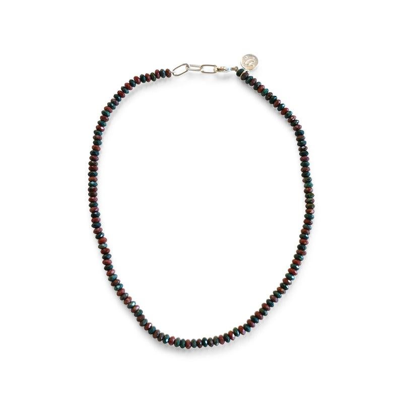 Story Behind The Jewelry
Purity necklace is designed to fall at the neckline and is laced with faceted, rich bloodstone with a sterling silver clasp and extension chain.  Bloodstone is a blend of hunter green and maroon red. The necklace is named