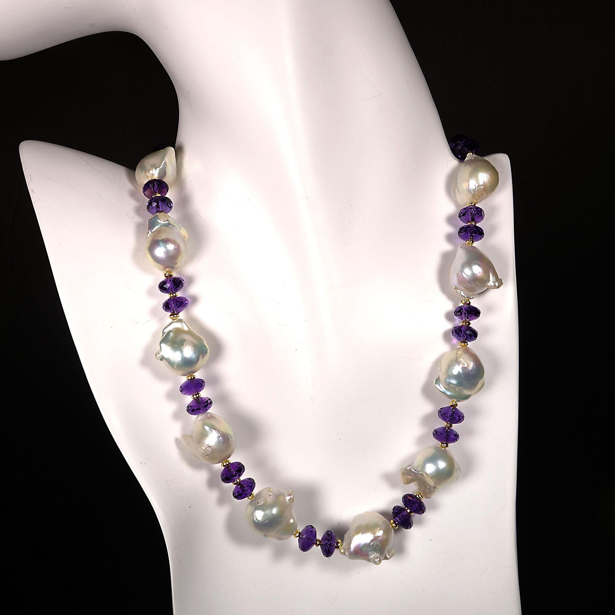 16.5 Inch Choker Necklace of Amethyst Rondelles and White Baroque Pearls.  This handmade stunning choker necklace features sparkling faceted Amethyst rondelles, 8MM, and iridescent White Baroque Pearls.  The purple in the Amethyst brings out the