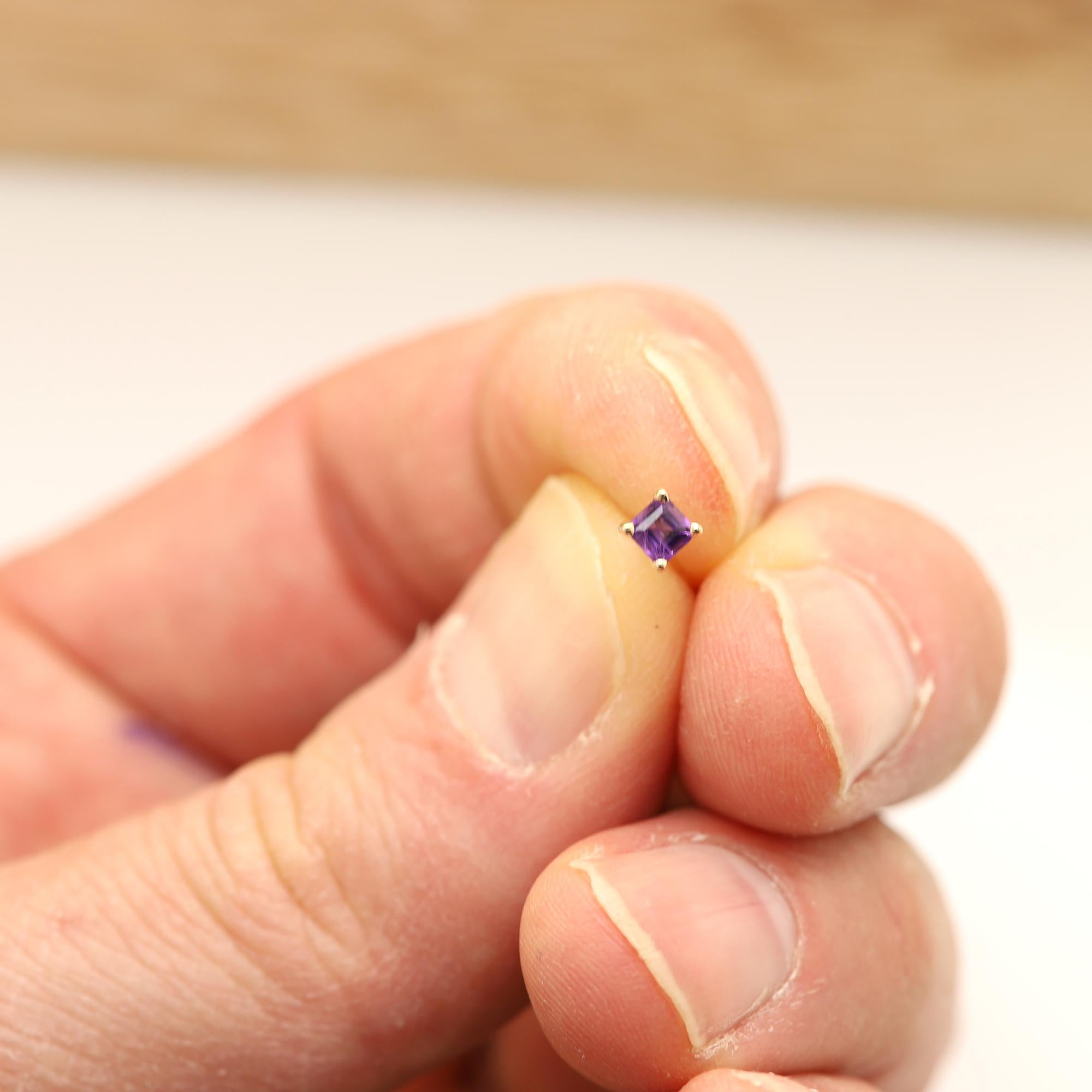 Solid 14k Yellow Gold 
Natural Purple Amethyst Gemstone
1 pair ( 2pieces )
each stone is 3.0 mm approx 0.20 carat 
Square shape
AA Quality Gems
due to natural formations minor inclusions or imperfections may occur
Good for any age
+Gift Box
