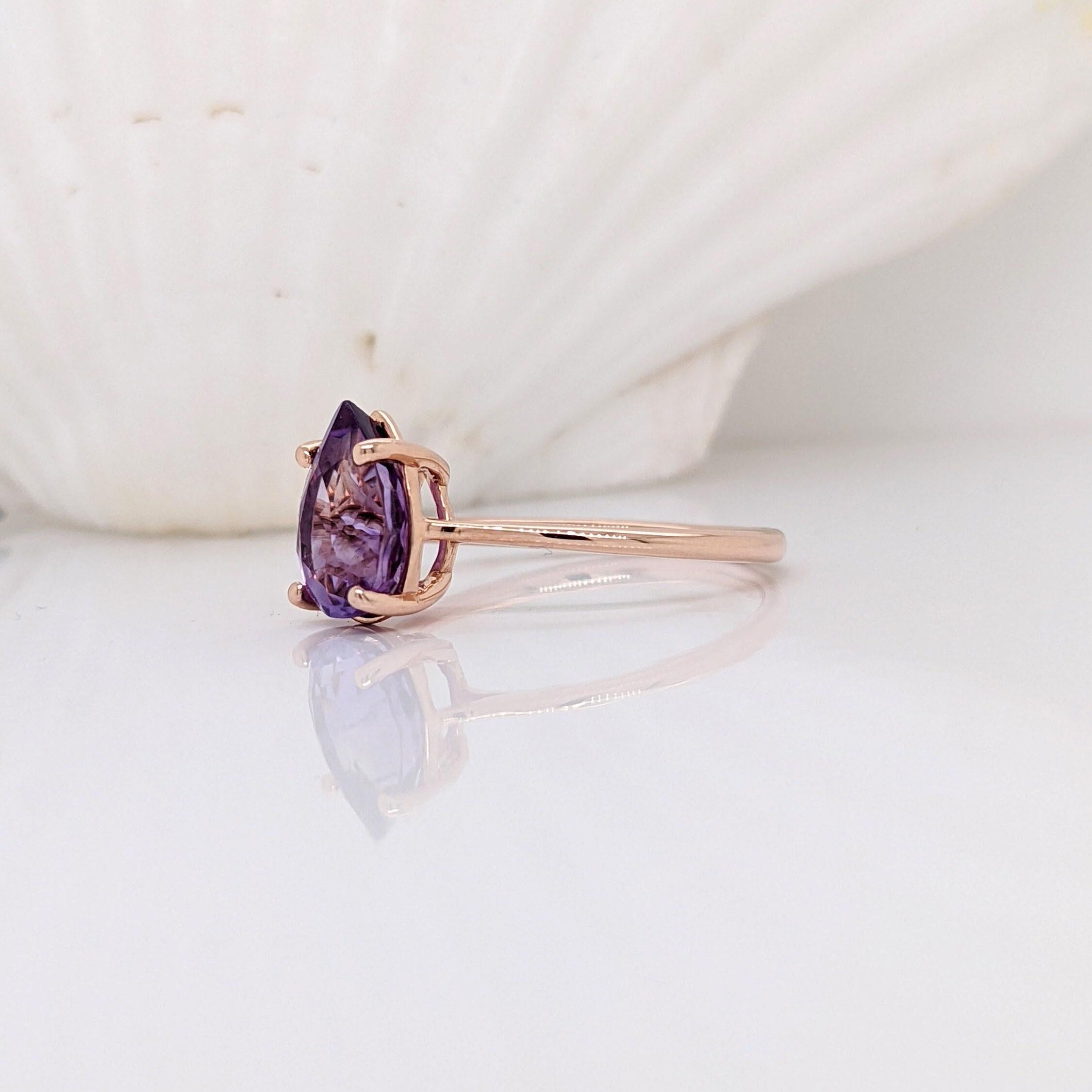 Specifications:

Item type: Ring
Center stone: Amethyst
Treatment: Heated
Weight: 2.10 ct
Head size: 10x7mm
Shape: Pear
Hardness: 7
Origin: Zambia

Metal: 14k/2.05g

SKU: AJR472/829

This setting is currently priced with Solid 14k Gold.

If you