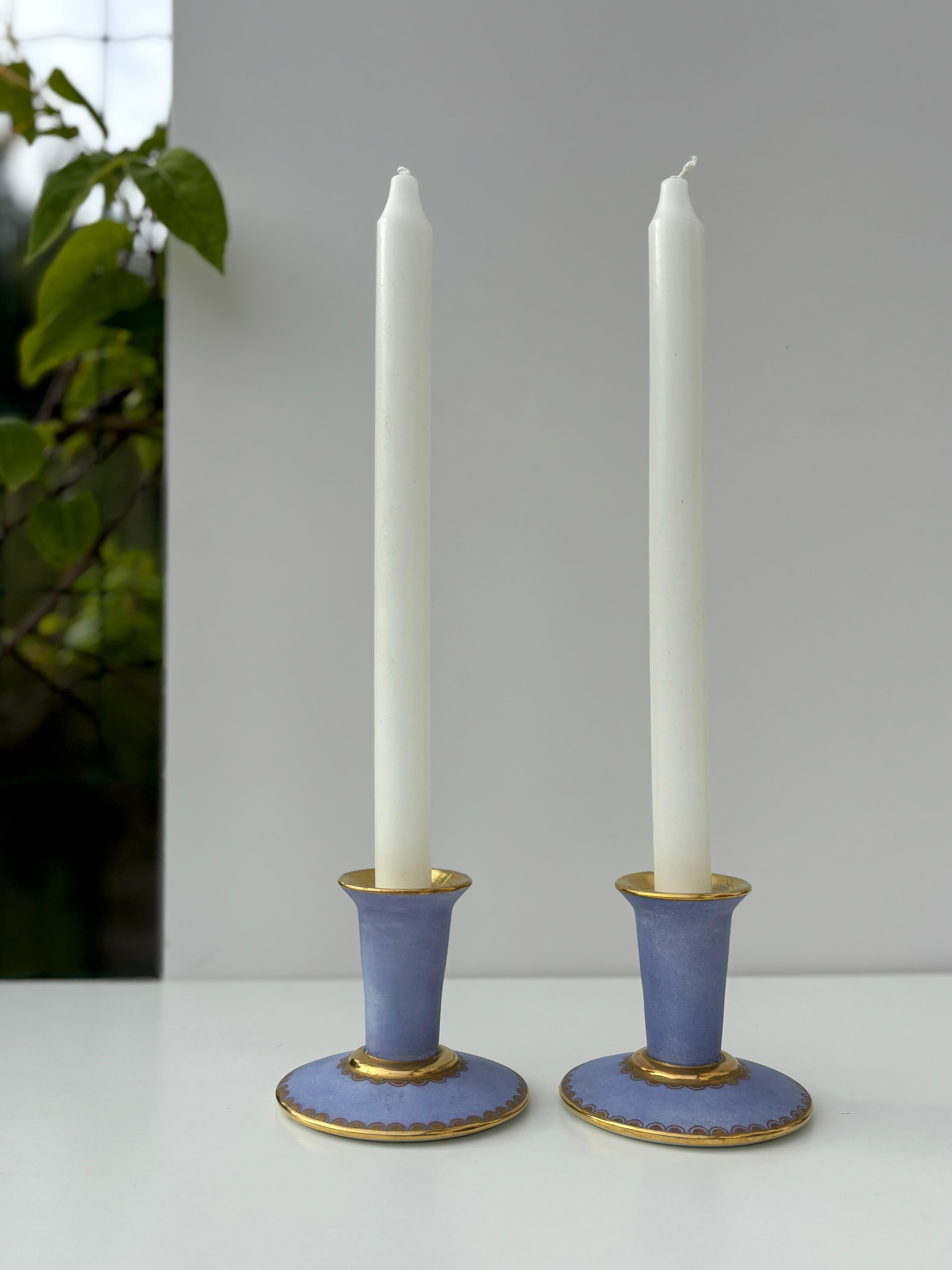 Matte lavender blue and shiny golden glazed porcelain candle holders by Danish manufacturer Lyngby Porcelæn in the 1960s. 
Stamped under base. 
Beautiful vintage condition. 
Denmark, 1960s.
