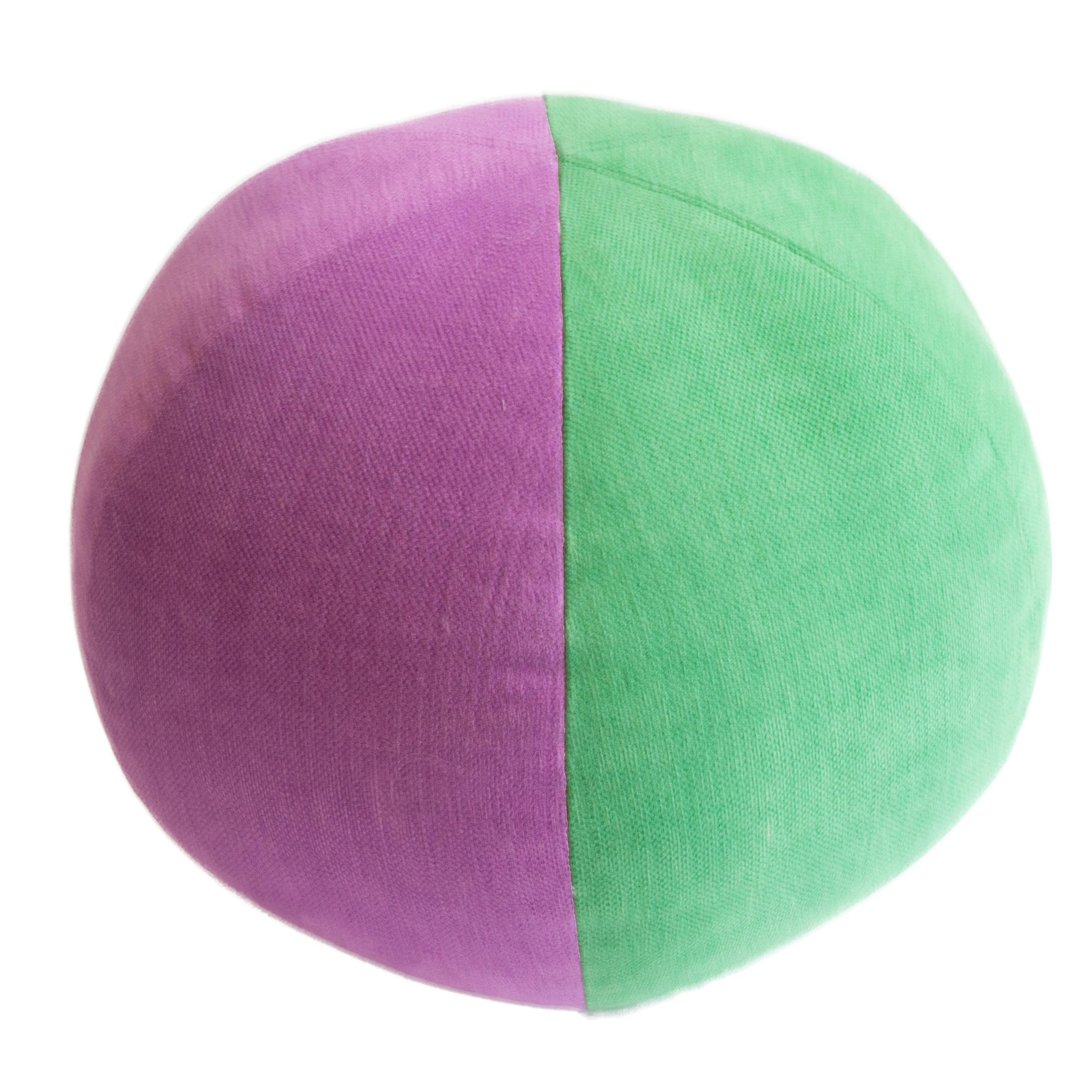 round purple throw pillow