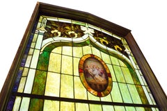 Purple and Green Slag Glass Window with Oval Scene