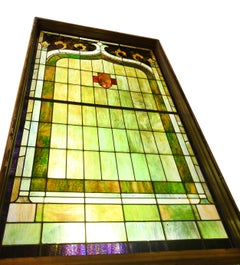 Purple and Green Slag Glass Window with Shield