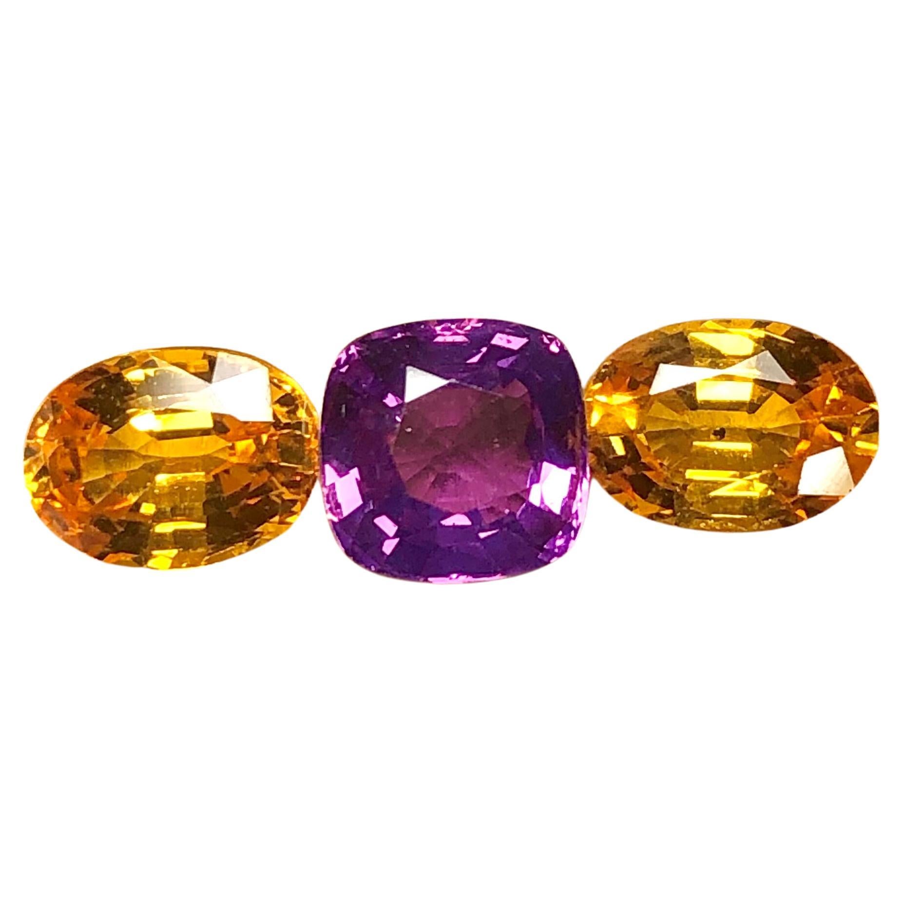 Purple and Yellow Ceylon Sapphires 3.66 Carat Three Stone For Sale