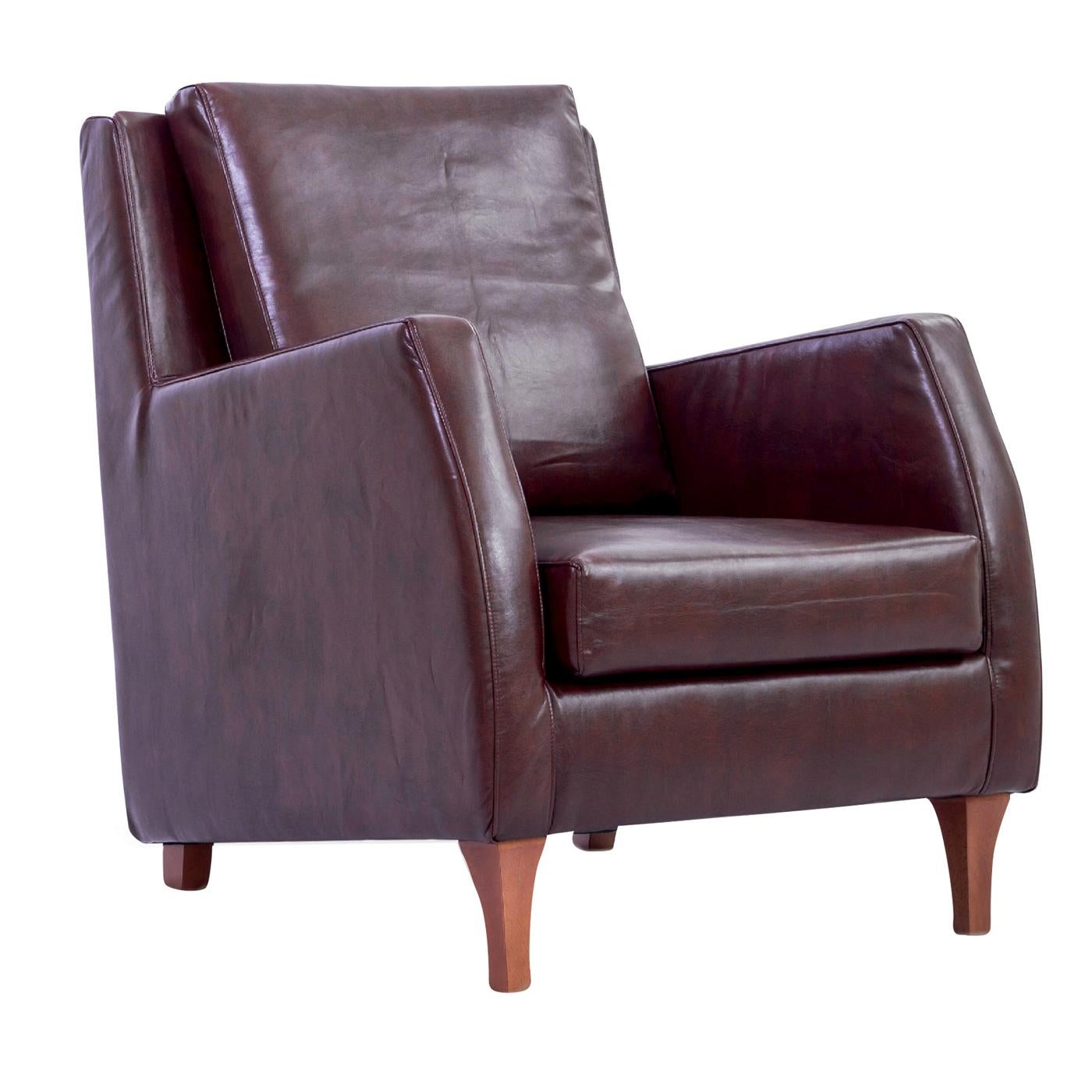 This contemporary armchair will add a touch of elegance and style to a private office or a modern living area. A design item that also features elegance and comfort, available in purple, can be personalized upon the customer's request. This