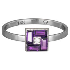 Purple baguette 14k gold ring.