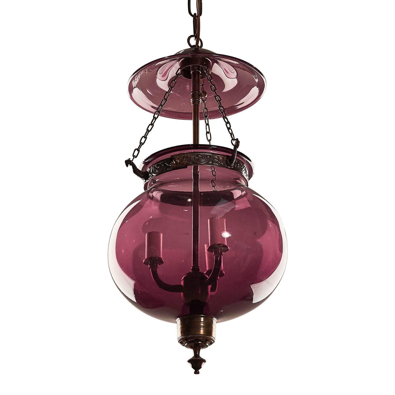 An Anglo-Indian amethyst bell jar lantern, circa 1900. Large wiring. A nice colored example with original cover and candle holder.

 
