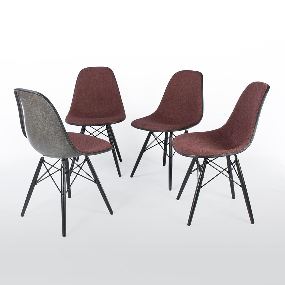 These are some beautifully revitalized classics finished in their beautiful purple and black fabric on black Herman Miller Eames side shell creating the perfect comfortable combination. Coupled with their newer, used, black DSW dowel bases, these