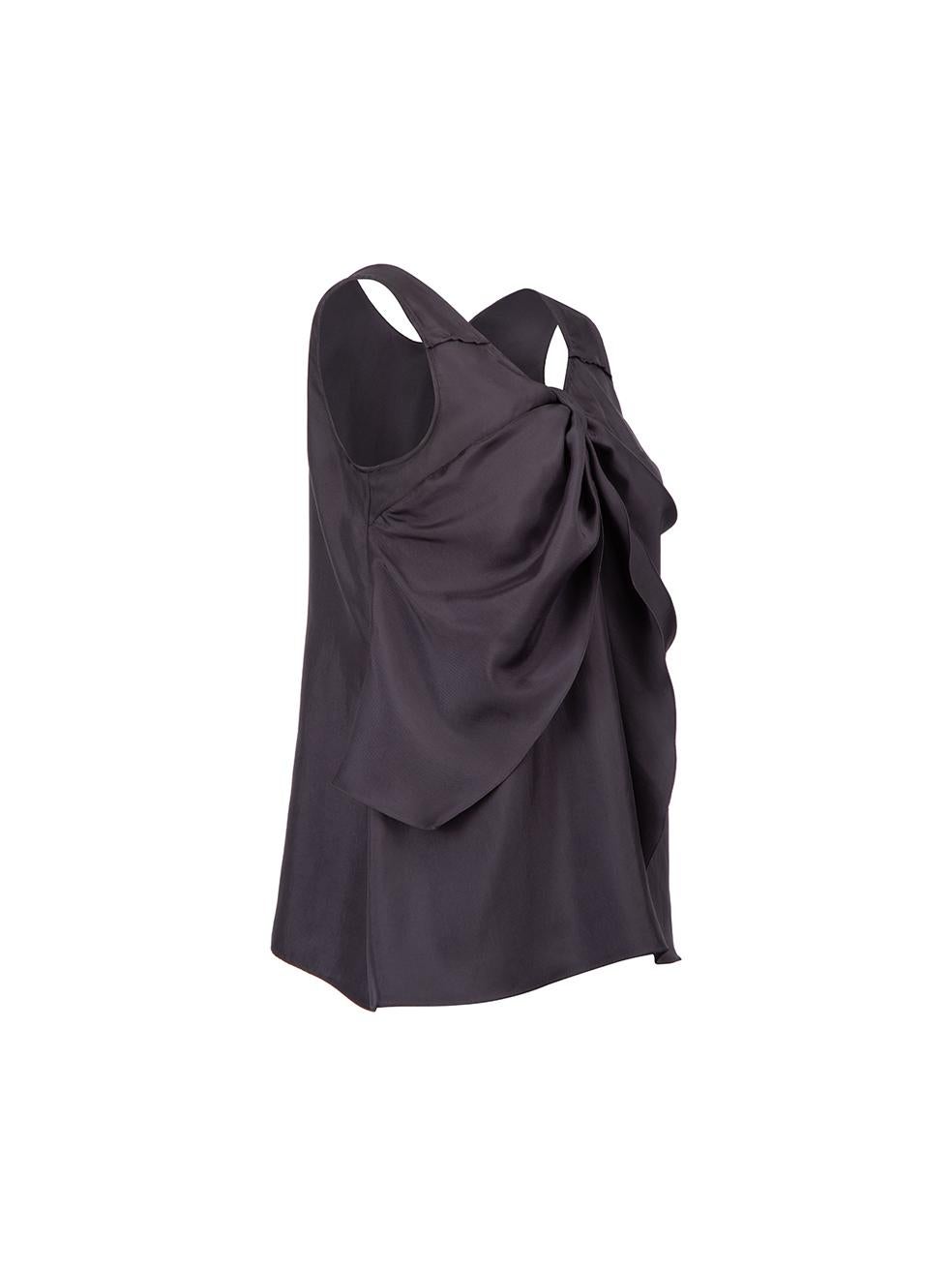 CONDITION is Very good. Hardly any visible wear to top is evident on this used Miu Miu designer resale item. 



Details


Purple

Polyester

Sleeveless tank top

Drape bow accent

V neckline

Back keyhole neckline with button closure





Made in