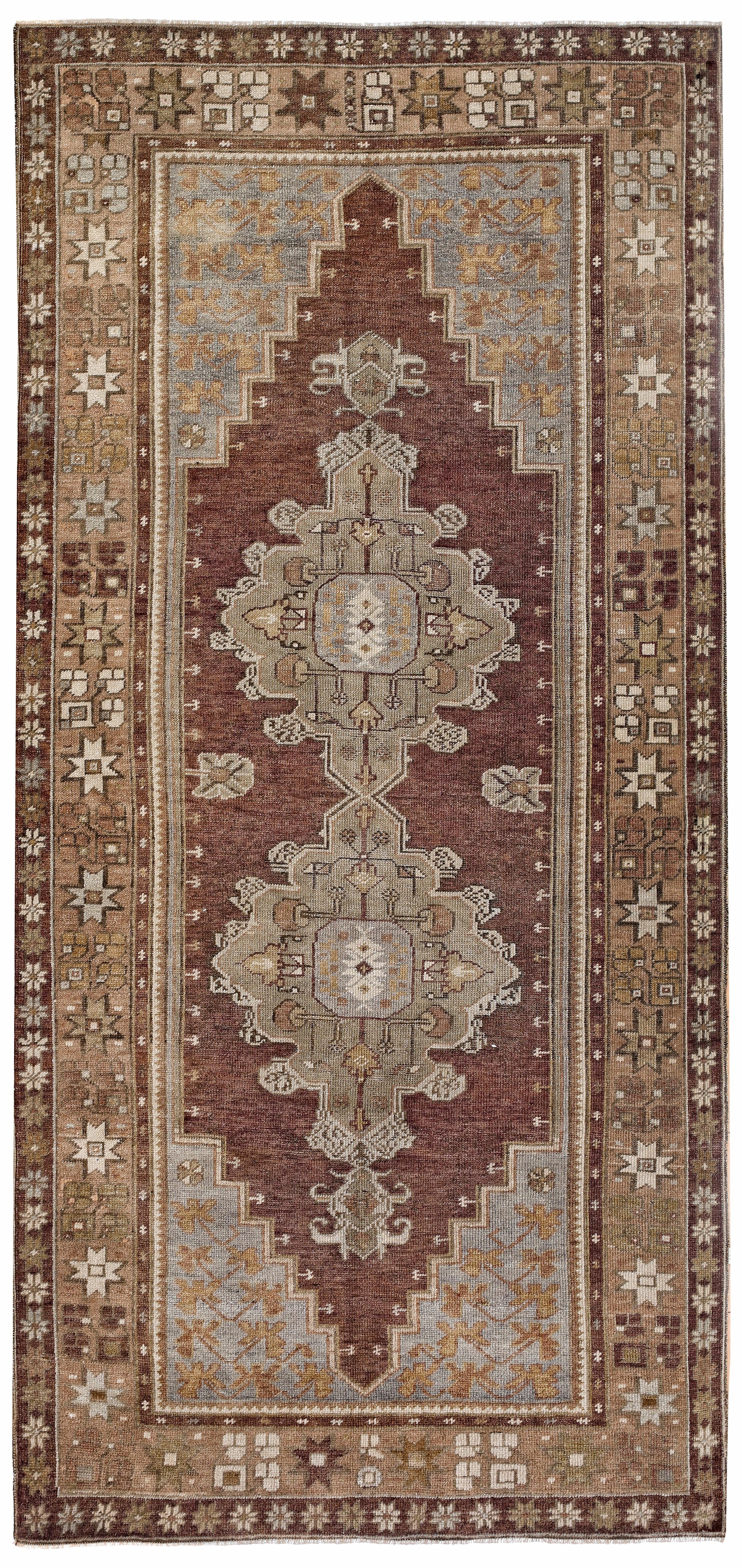 Anatolian rugs are hand knotted in the Central Anatolia or Asia Minor region of Turkey. The patterns are from ottoman era as well as modern Turkey. The central medallion used in this rug symbolizes the central authority of the ottoman sultans. In