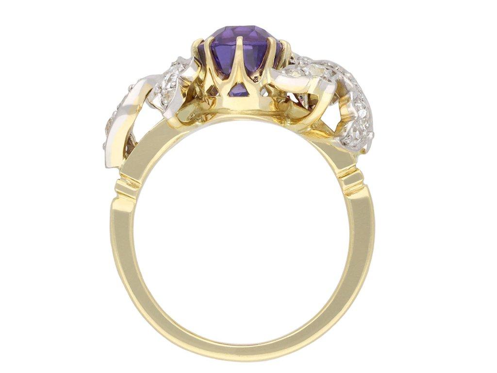 Oval Cut Purple Ceylon Sapphire and Diamond Cluster Ring, circa 1910 For Sale