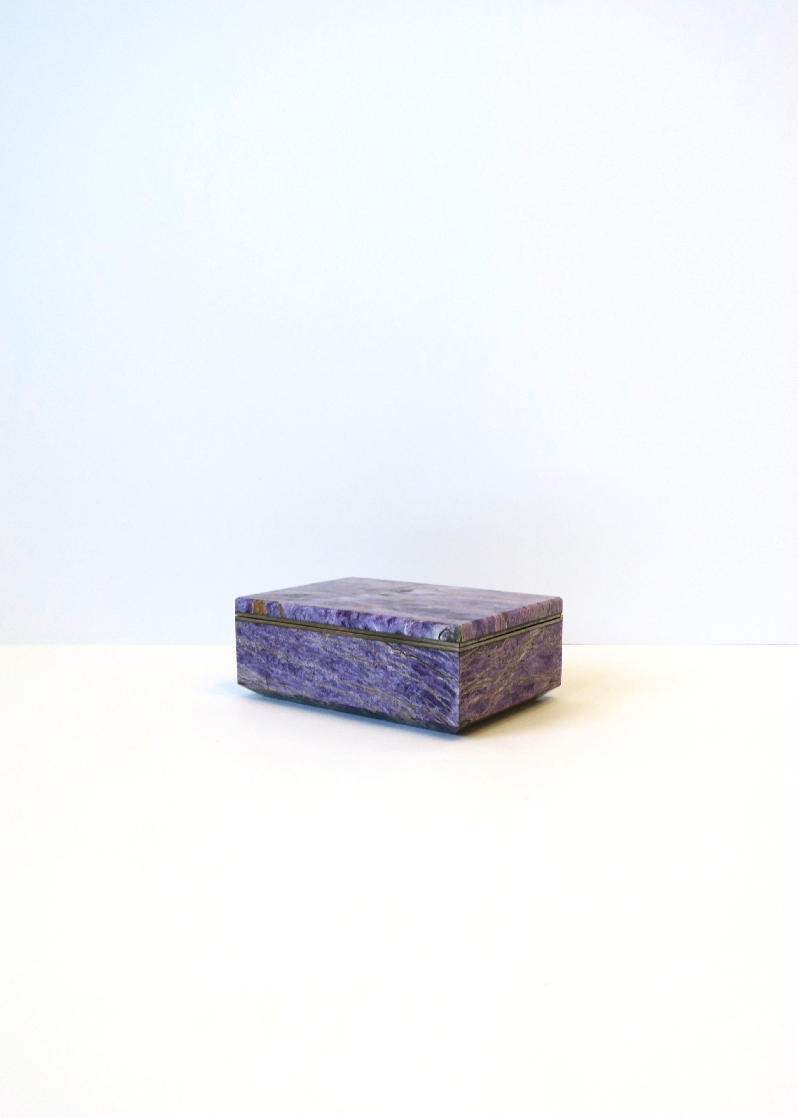 A very beautiful, substantial and rare natural purple charoite jewelry box, circa late-20th century. Charoite is rare mineral aka 'lilac stone'. A beautiful organic pattern graces this charoite stone; Piece is hand-made, polished smooth with