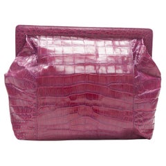 Purple crocodile scaled leather angular frame pouch clutch bag