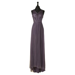 Purple draped evening dress in silk tulle with drag CATHERINE DEANE Purple draped evening dress in silk tulle with drag CATHERINE DEANE