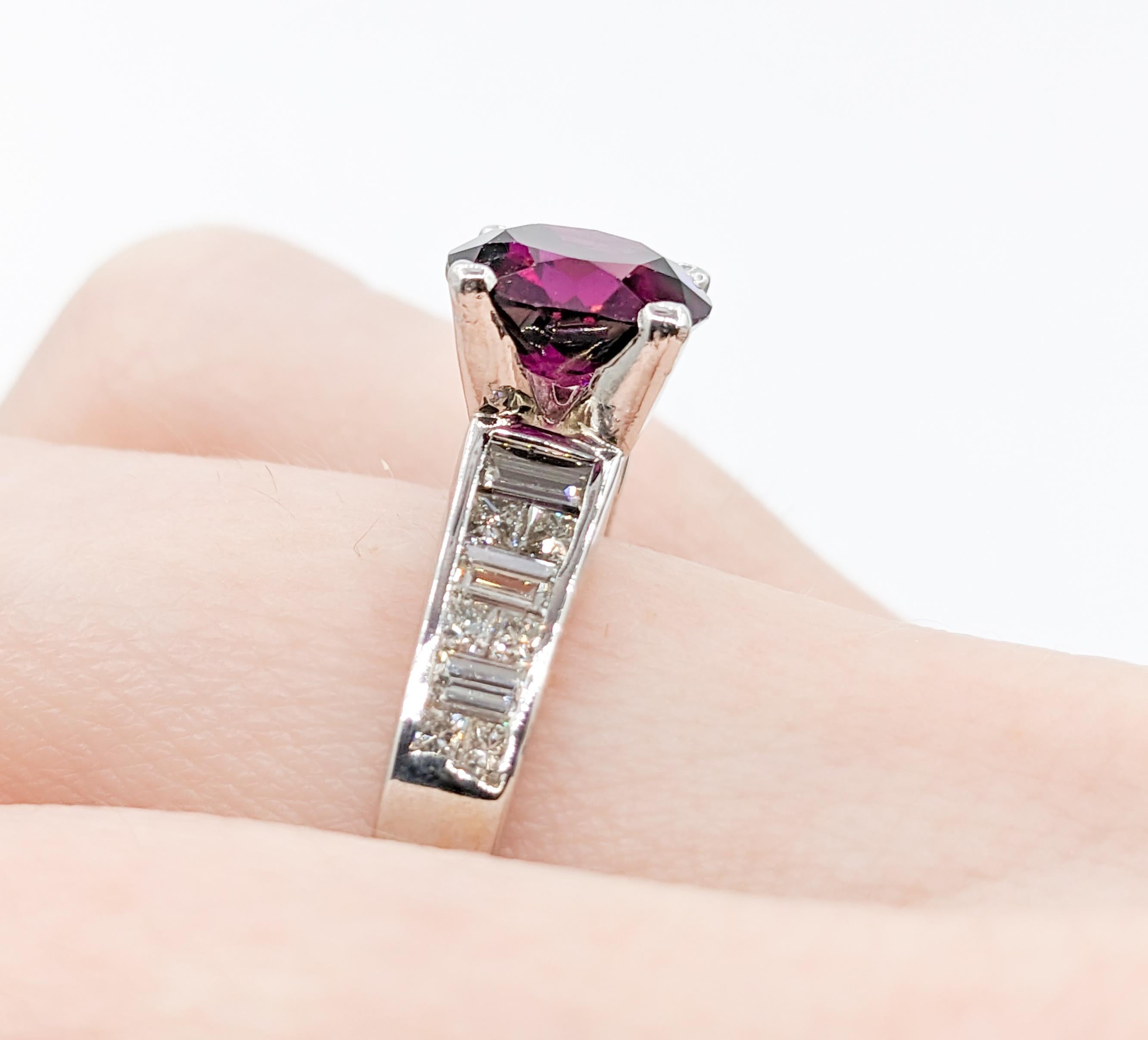 Purple Garnet & Diamond Ring in White Gold

Elevate your style with our exquisite ring, masterfully crafted in the timeless elegance of 18k white gold. This captivating piece is adorned with a total of 1.00 carats of baguette & princess cut
