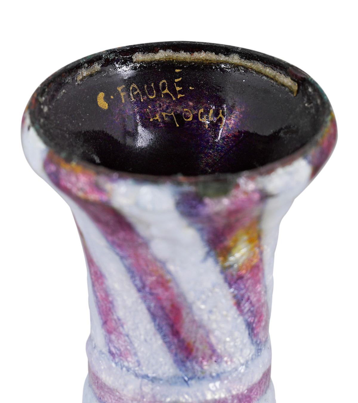 This exceptional Art Deco-period vase was crafted by the master of enamelwork Camille Fauré. Based in the famed Limoges, France, Fauré made a name for himself after developing his distinctive technique of hand-painting colorful enamel over copper.
