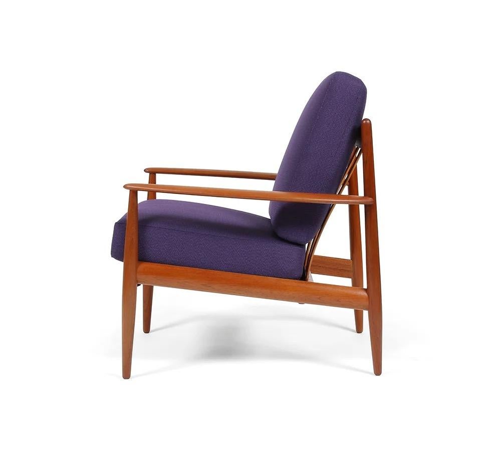 Here is the France and Son Model 118 in teak by designer Grete Jalk. This 1950s/60s Danish lounge chair is refinished and has brand new upholstery.
 
The frame is solid teak, and was recently refinished. The loose cushions are original with the