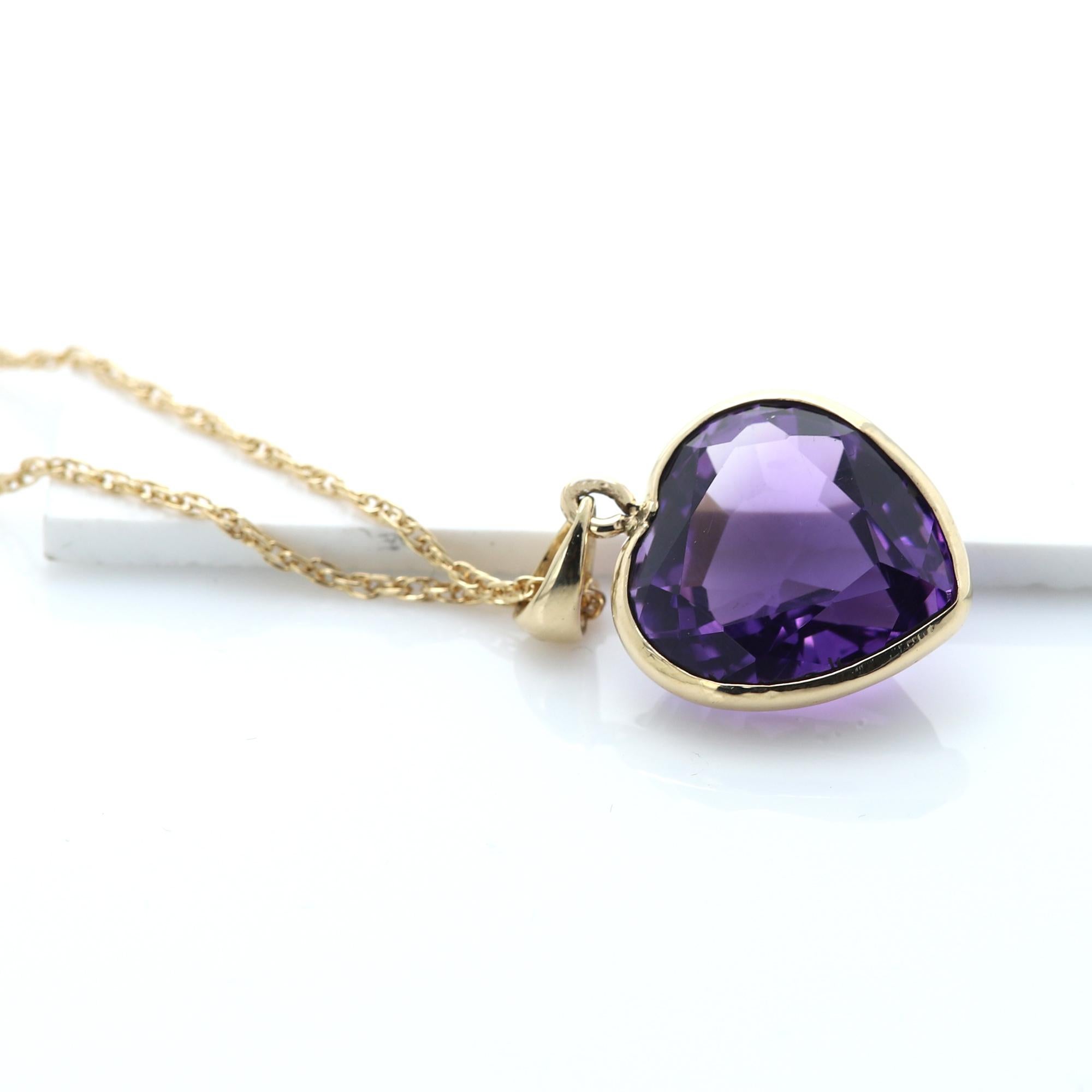 Large Purple Heart Pendant 13.60 carat
Deep Purple Amethyst Heart Shape Pendant
Natural Amethyst Gemstone
Bezel set in 14k yellow gold total weight 3.6 grams (without the chain)
Amethyst is 13.60 carat - Nice Brilliant Rich purple tone Color.
Size: