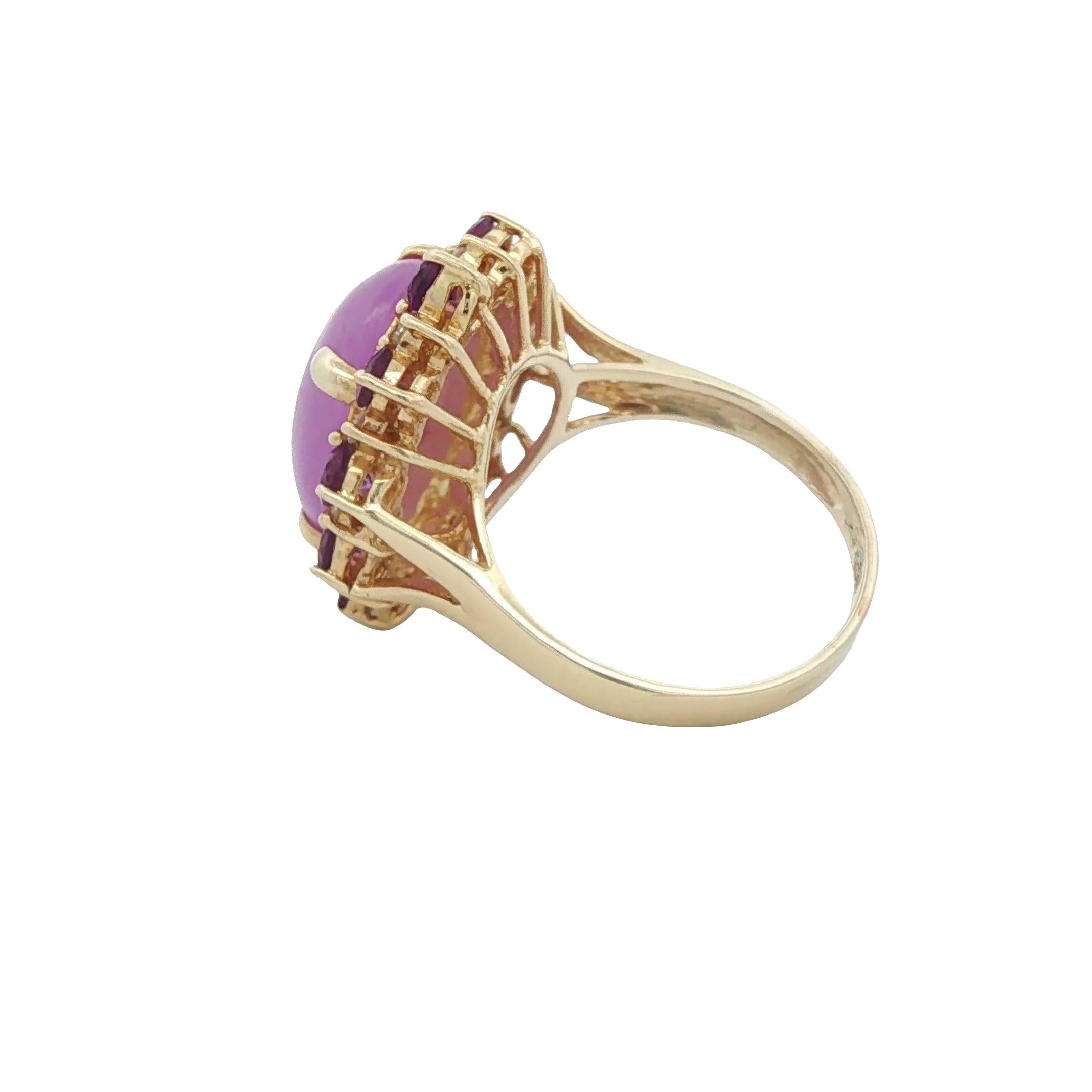 This is a large oval cabochon of purple jade (treated for color and clarity). The cabochon jade measures 16 x 12.2 x 4.8mm. The diamonds are I1 / I-J color (approx .3ctw). The purple amethyst add dimension and depth of color. Crafted in 14k yellow