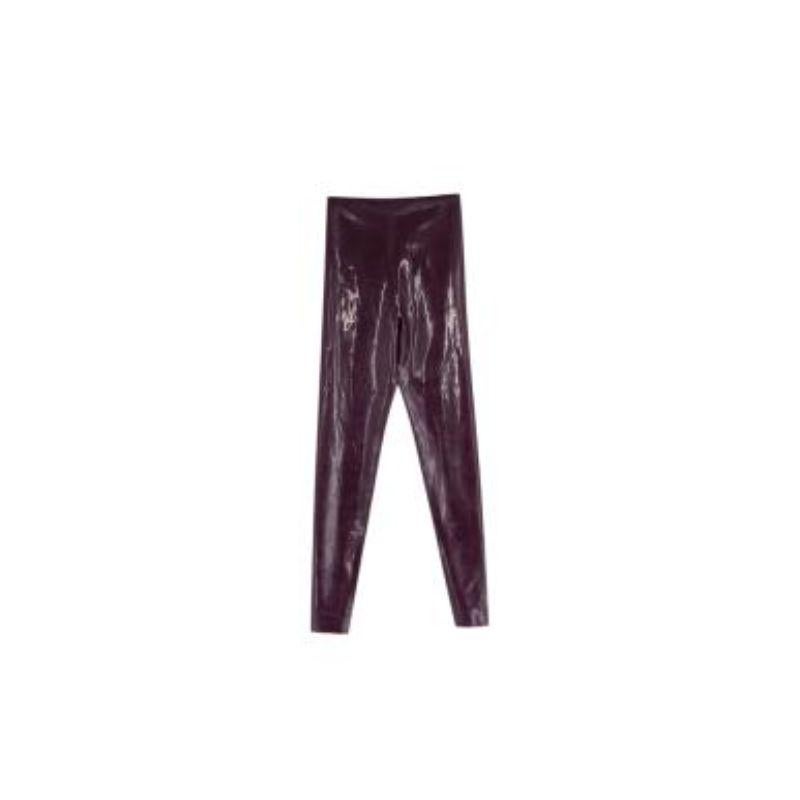 Saint Laurent Purple latex leggings
  
 - Glossy plum purple high rise latex leggings
 - Form fitting
 - Includes care kit to maintain the leggings
 
 Materials
 100% Latex
 
 Made in France
 Do not wash- use care kit to clean
 
 PLEASE NOTE, THESE
