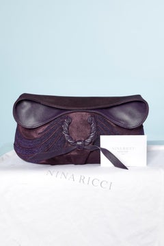 Purple leather " Ondine" clutch with lurex threads embroideries NINA RICCI