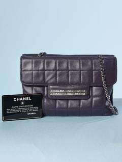 Purple leather top-stitched bag with rhinestone on one side Chanel Numbered
