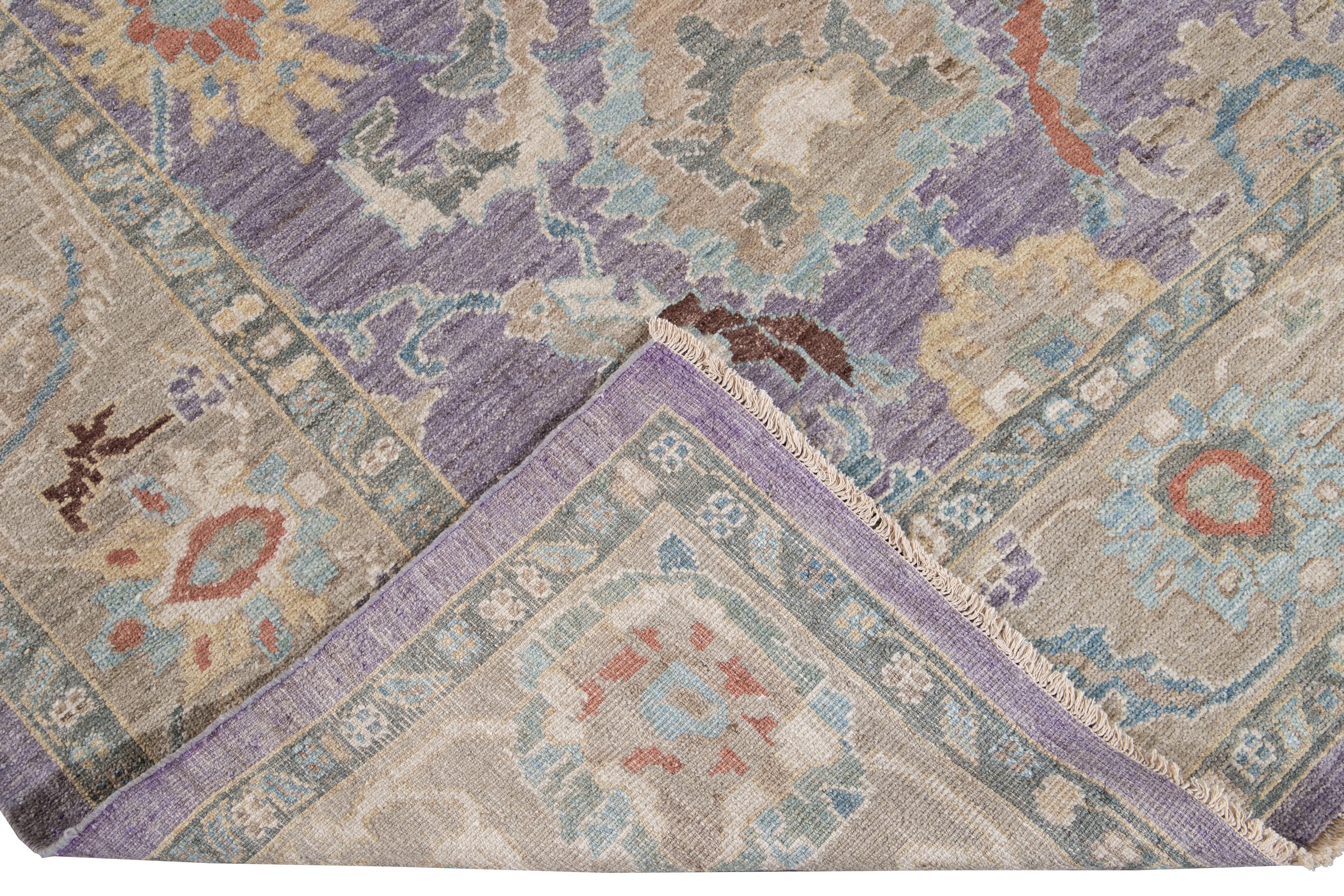 Beautiful contemporary Sultanabad hand knotted wool rug with a purple field. This Sultanabad rug has a multi-color accent in an all-over Classic floral medallion design.

This rug measures: 5'11