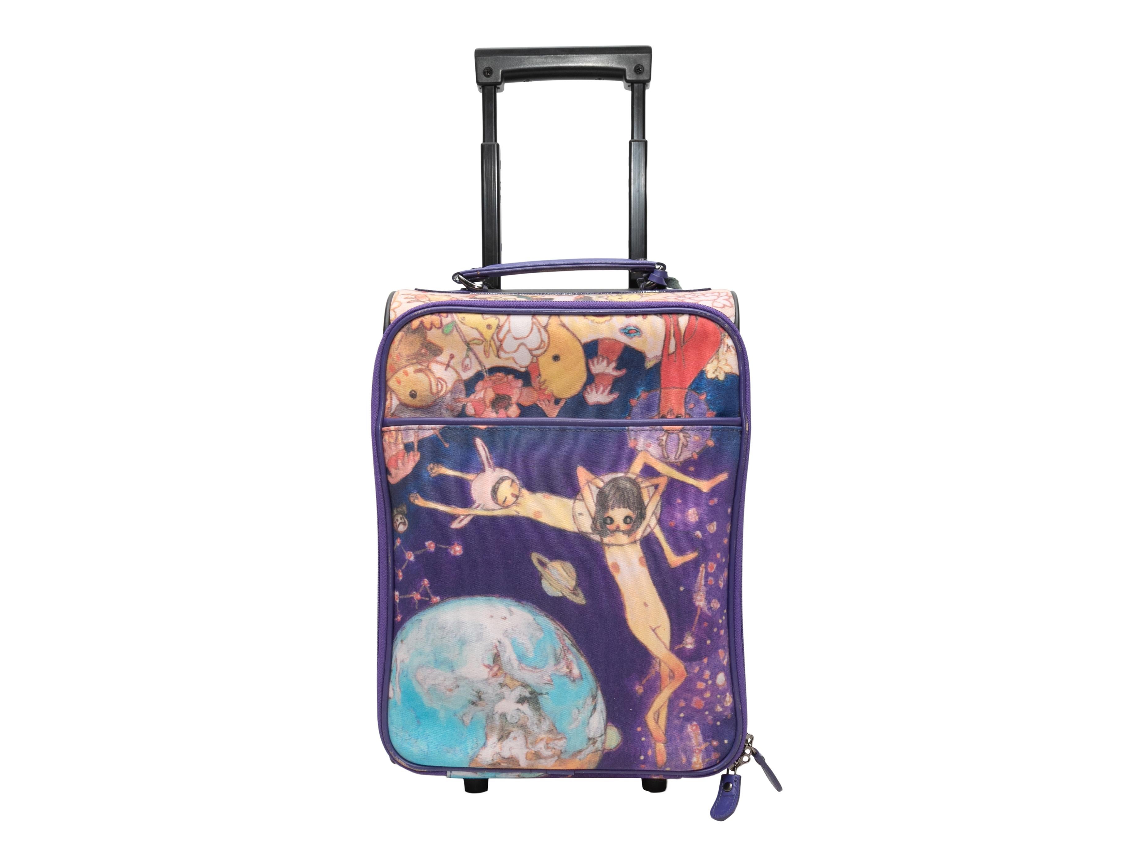 Purple & Multicolor Issey x Aya Takano Fall/Winter 2004 Printed Mini Suitcase. This suitcase features a printed nylon body, a front zip pocket, a single flat top handle, a top extendable handle, back wheels, and a top zip closure. 14
