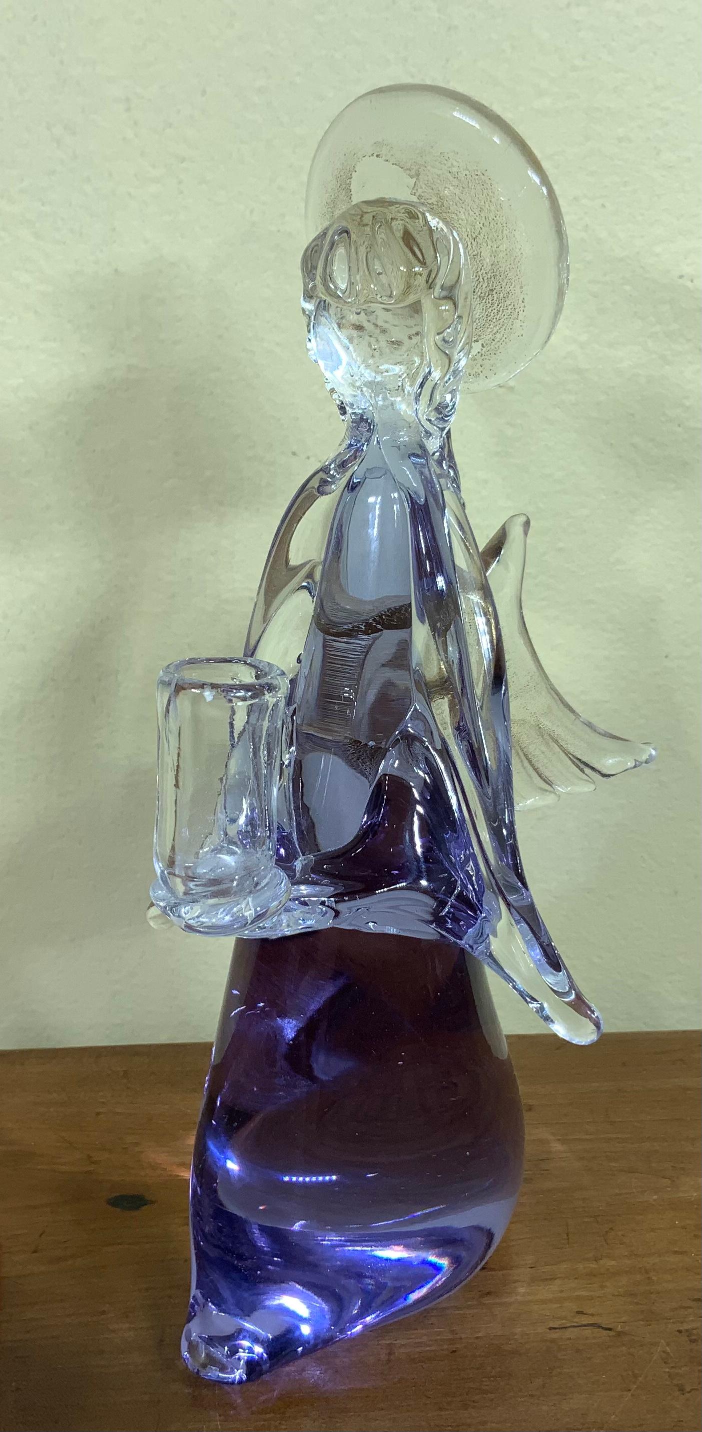V 
Beautiful vintage Murano hand blown Italian art glass angel candleholder figurine sculpture. It has beautiful gold frosted wings and halo, exceptional object of art for display.