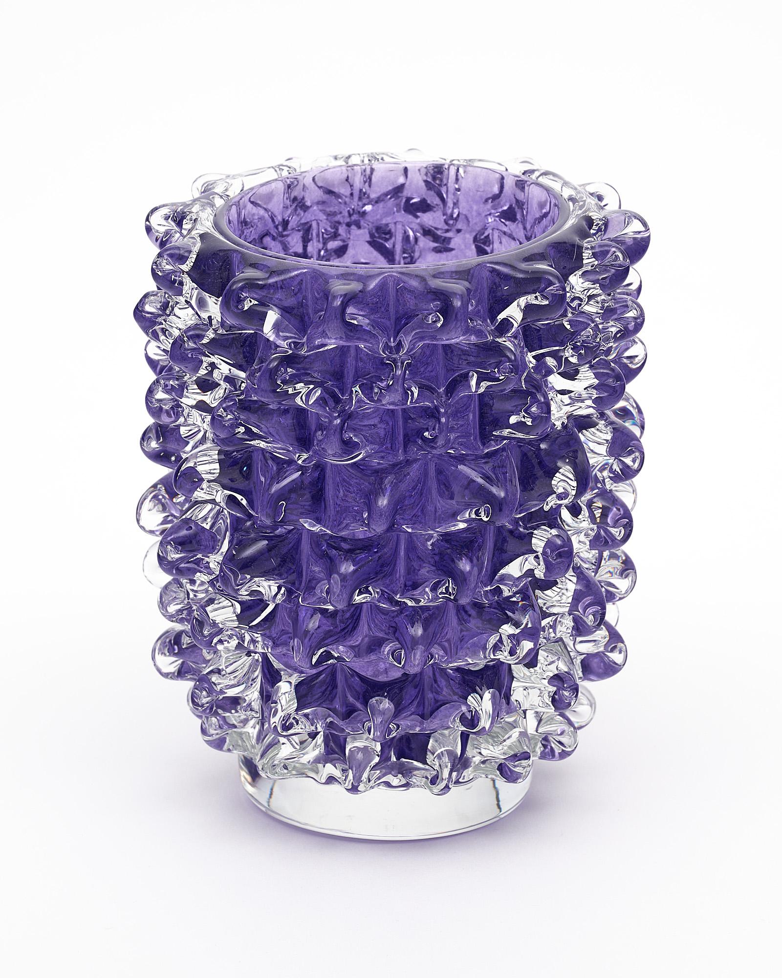 Murano glass vase, Italian, from the island of Murano. This hand-blown piece has a striking purple color and is made with the rostrate technique.