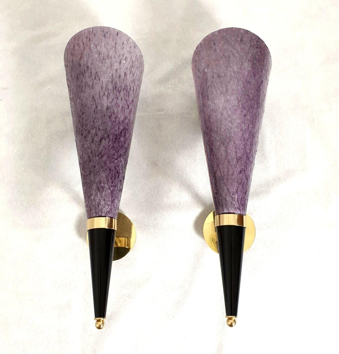 Pair of tall purple Murano glass and brass sconces by Mila Schon, Italy Mid Century Modern. Circa 1970.
The sconces are stamped: Mila Schon, Arte Vetro di Murano, on the glasses.
The sconces are tall, made of a purple textured Murano glass vase,