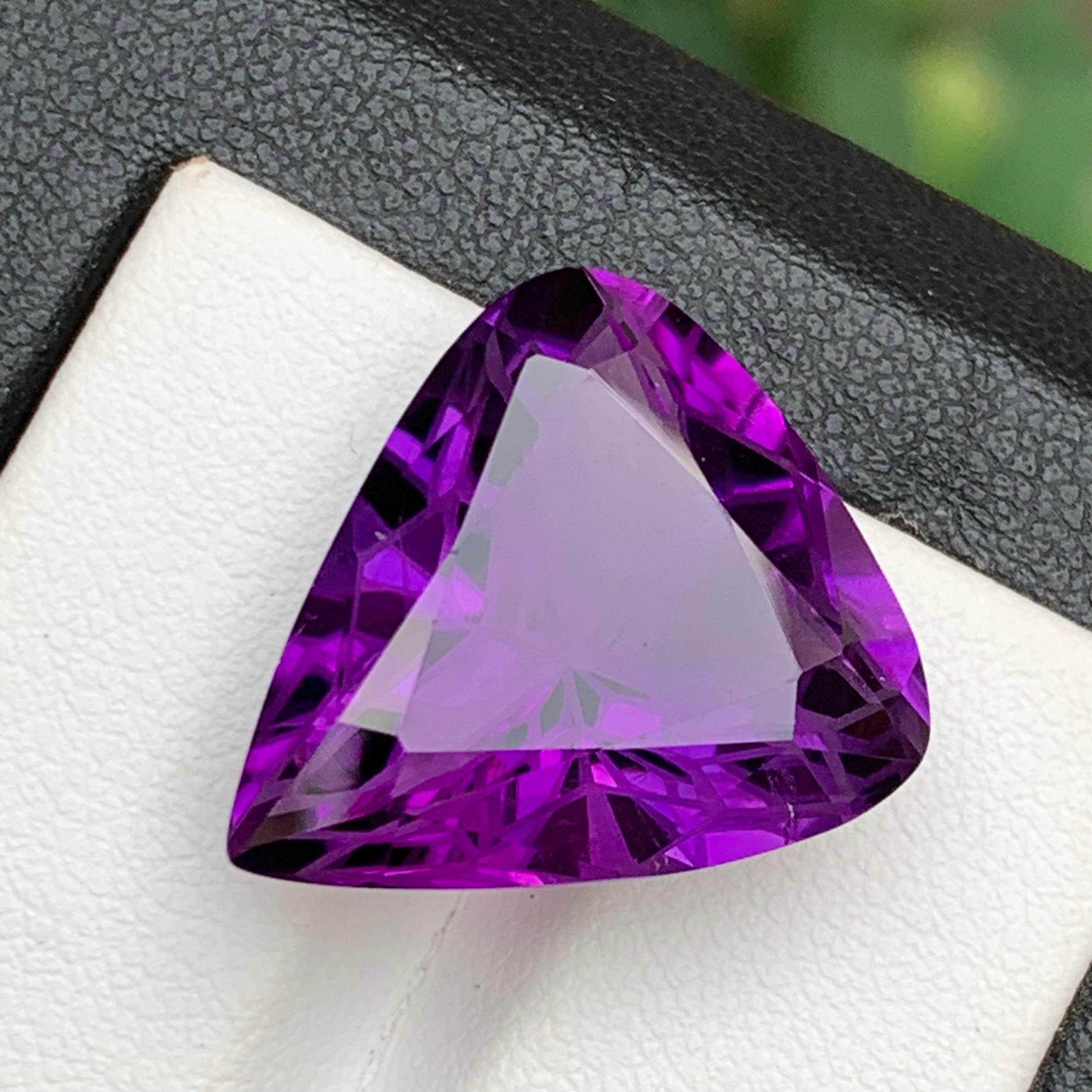 Rich Purple Natural Amethyst Loose Gemstone for Necklace Pendants, or any other Jewelry Setting!!

💎 GEMSTONE TYPE: Amethyst 
⚖️ WEIGHT: 18.30 Carats
🪚 SHAPE & CUT: Trillion Flower Cut
📏 SIZE (MM): 20.48 x 18.35 x 10.83
🌈 COLOR:  Purple
🔎
