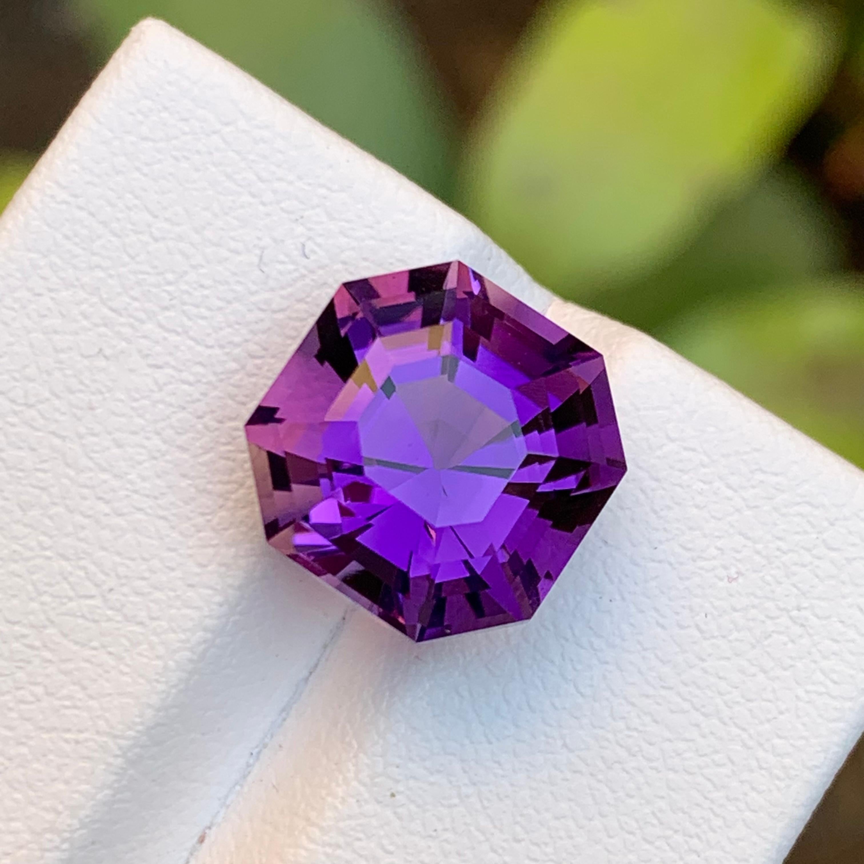 Introducing our exquisite Purple Amethyst, a mesmerizing gemstone weighing 8.40 Carat. Meticulously crafted in the timeless Octagon Asscher cut, its stunning facets showcase the gem's natural beauty. Perfect for a refined lady or gentleman seeking a