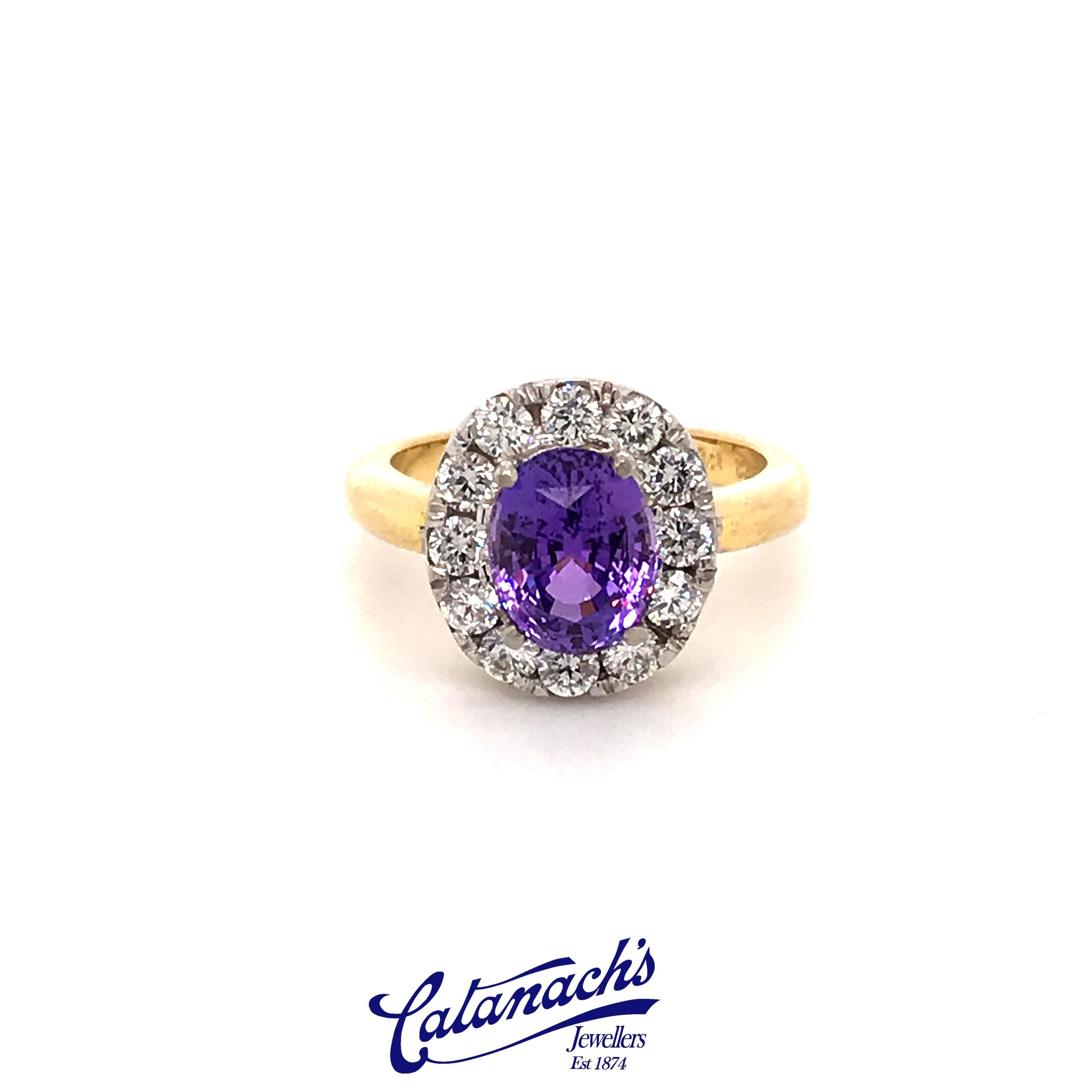 Lovely bright oval faceted purple ceylon sapphire and diamond cluster ring in 18ct yellow and white gold, 
- purple oval sapphire 2.80ct - 8.86mm x 7.04mm 
- 12 round brilliant diamonds totalling 0.72ct GSI
Ring is size M and can be resized 