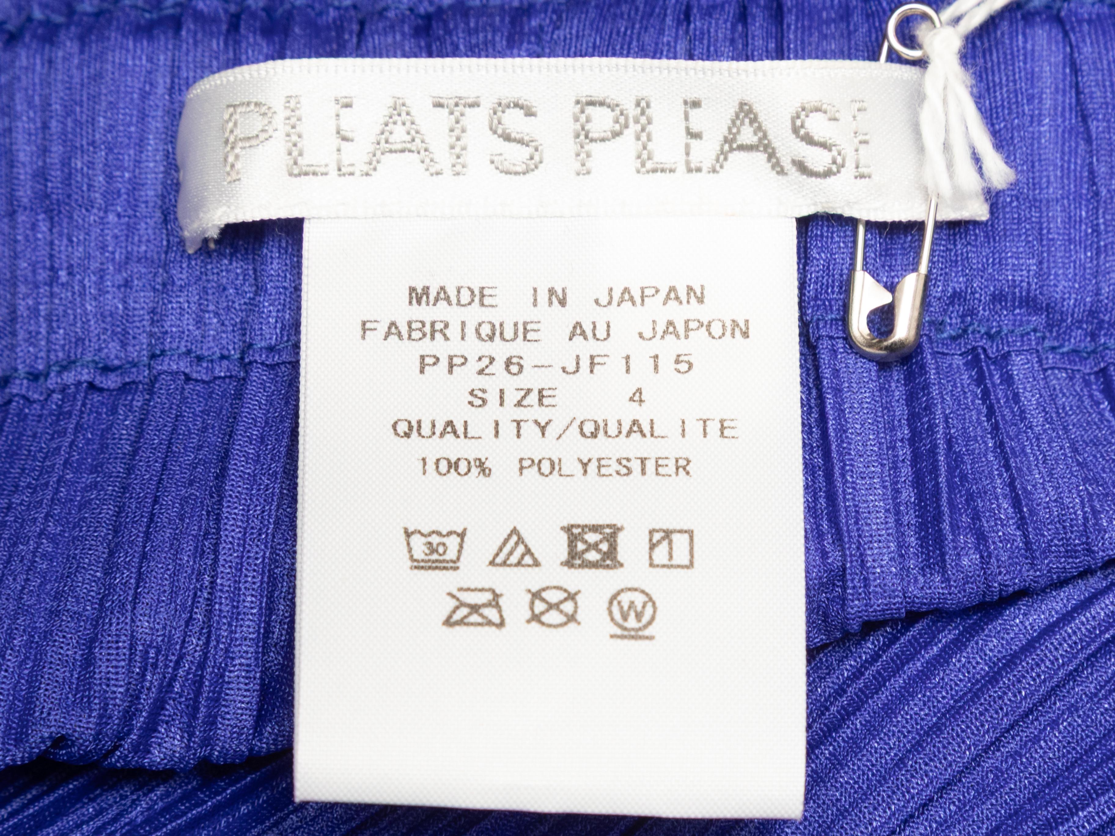 Pantalon skinny-leg en plissé violet de Pleats Please Issey Miyake. Taille élastiquée. Taille de 26
