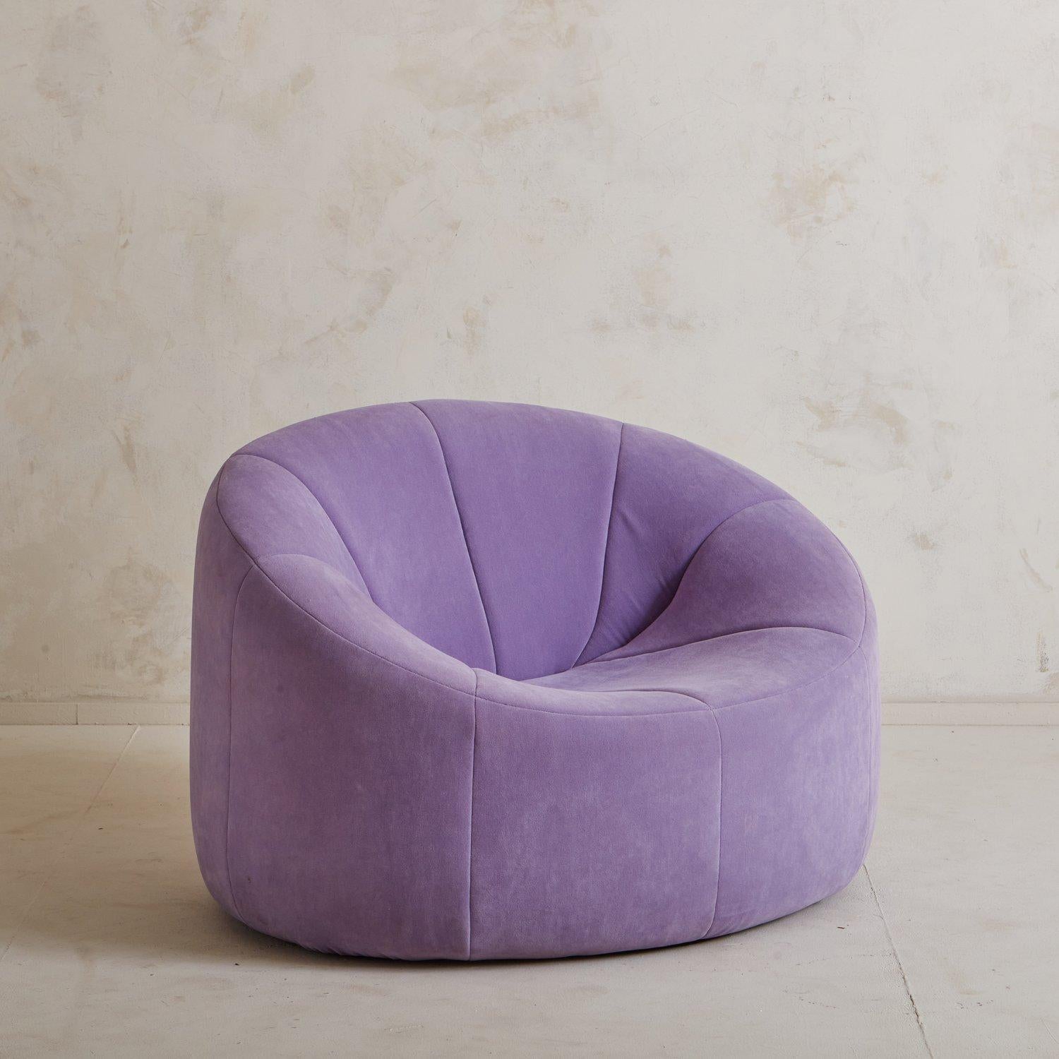 An iconic Pumpkin chair designed by Pierre Paulin in 1971 and produced in France by Alpha. This iconic chair retains its original purple suede upholstery and ‘Made in France’ tag on the seat back. Sourced in France.

This chair was designed for the