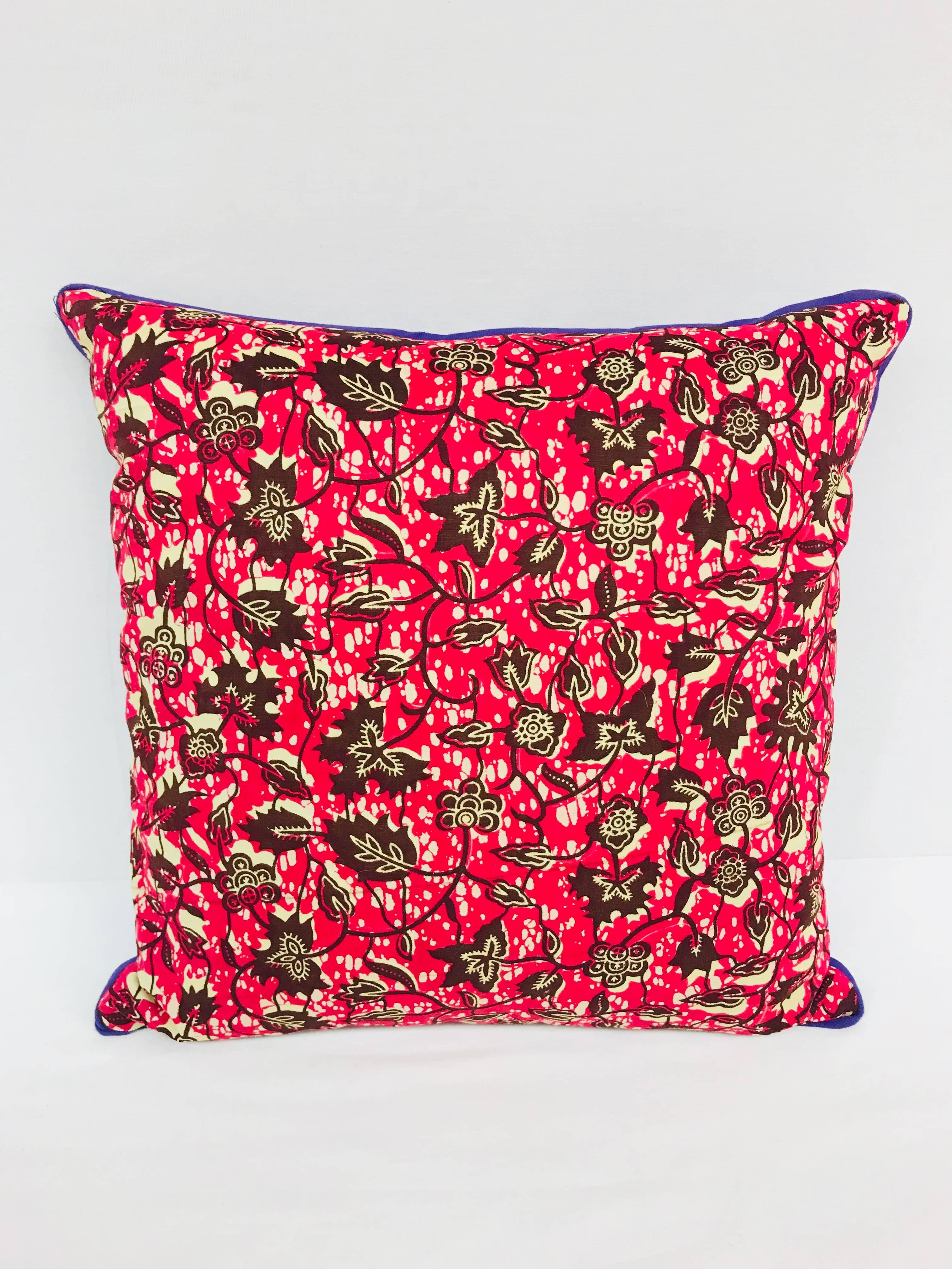 Crafted exclusively for Madcap Cottage in the USA, this African wax print pillow will bring a big dollop of delicious to a neutral sofa, bed, or chair. Backed in a kicky purple hue. Made from Vlisco authentic Dutch Wax fabrics. Hidden zipper. Down