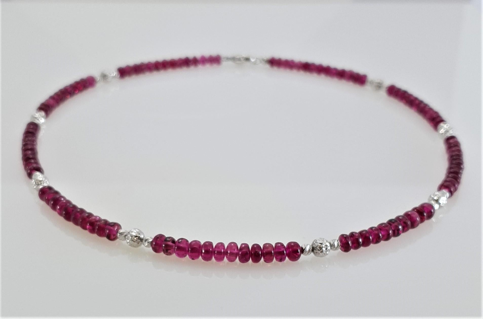 This Natural Purple Red Rubelite Tourmaline Rondel Beaded Necklace with 18 Carat White Gold is handmade. Cutting as well as goldwork are made in German quality. The screw clasp is easy to handle and very secure.
Timeless and classic design combined