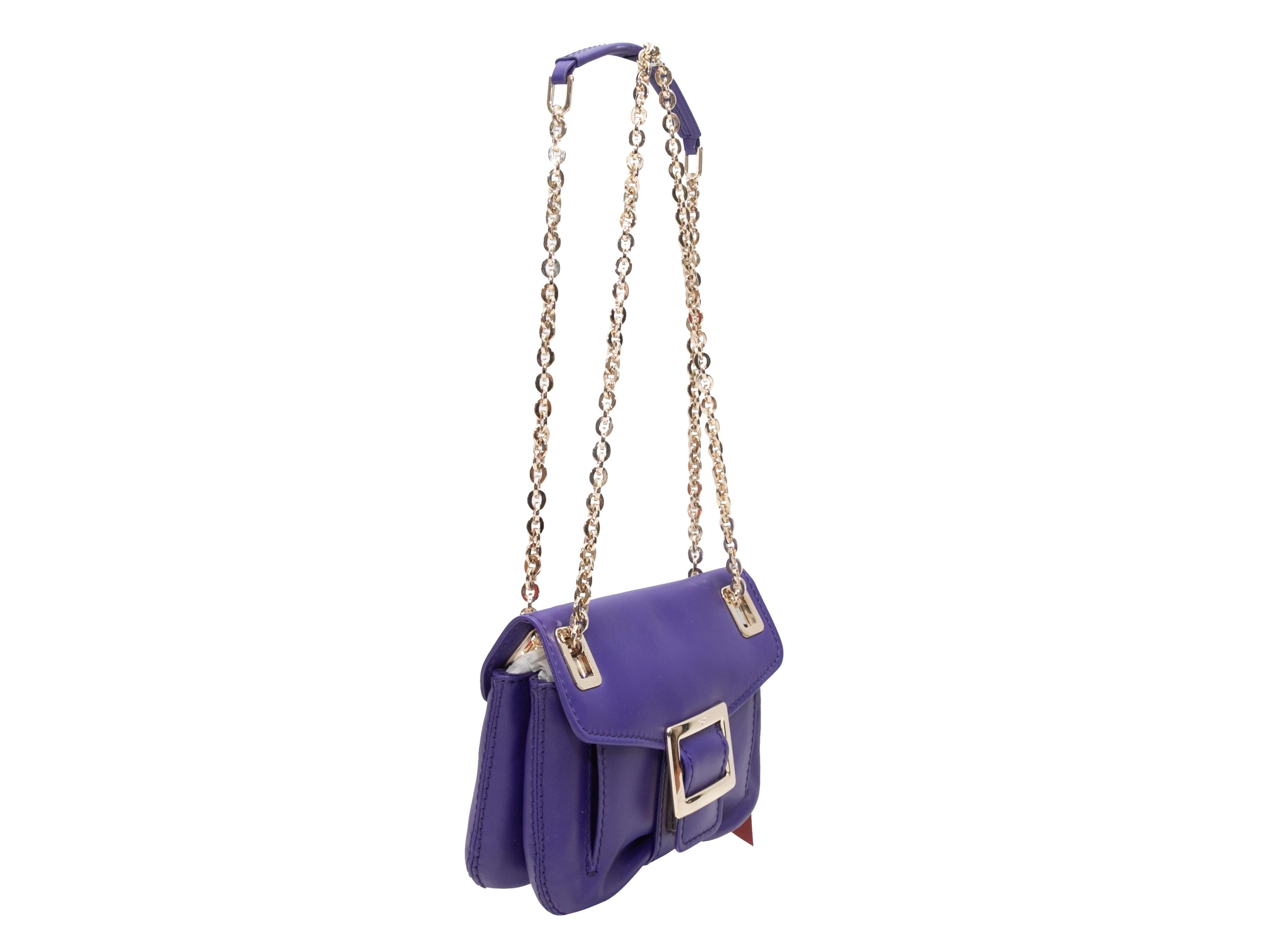 Purple Roger Vivier Metro Micro Crossbody Bag. The Metro Micro Crossbody Bag features a leather body, gold-tone hardware, a single top handle, a back zip closure, a chain-link shoulder strap, and a front buckle flap closure. 8