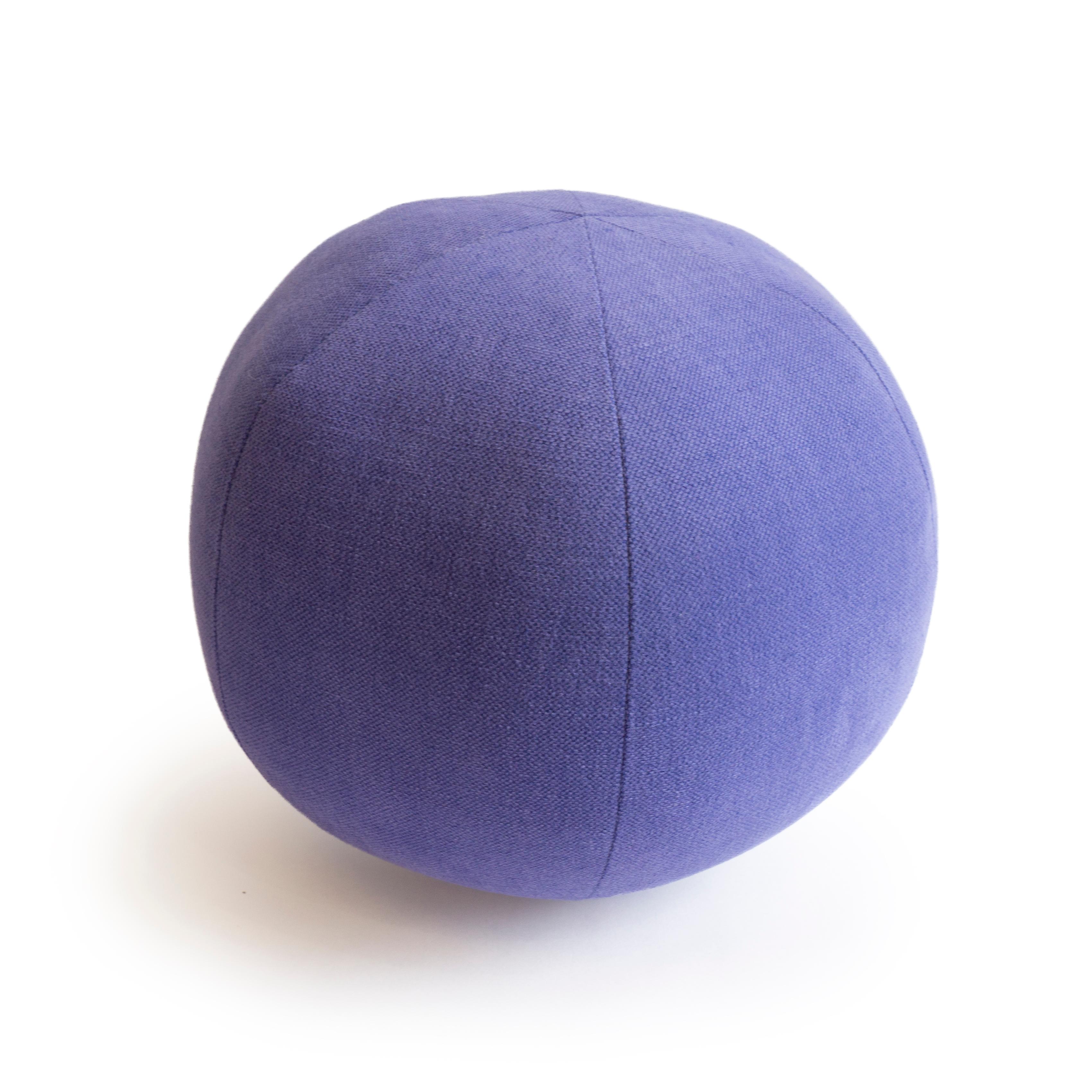 This is a hand sewn round ball throw pillow in a purple fabric. All pillows are handmade at our studio in Norwalk, Connecticut. 

Measurements: 9