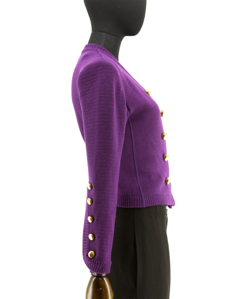 Saint Laurent Rive Gauche purple knitted jacket with a military inspiration featuring 2 rows of gold buttons.

Original 1970s. Saint Laurent Rive Gauche. 100% wool

Vintage designer jackets sourced by Stelios Hawa with the objective to bridge the