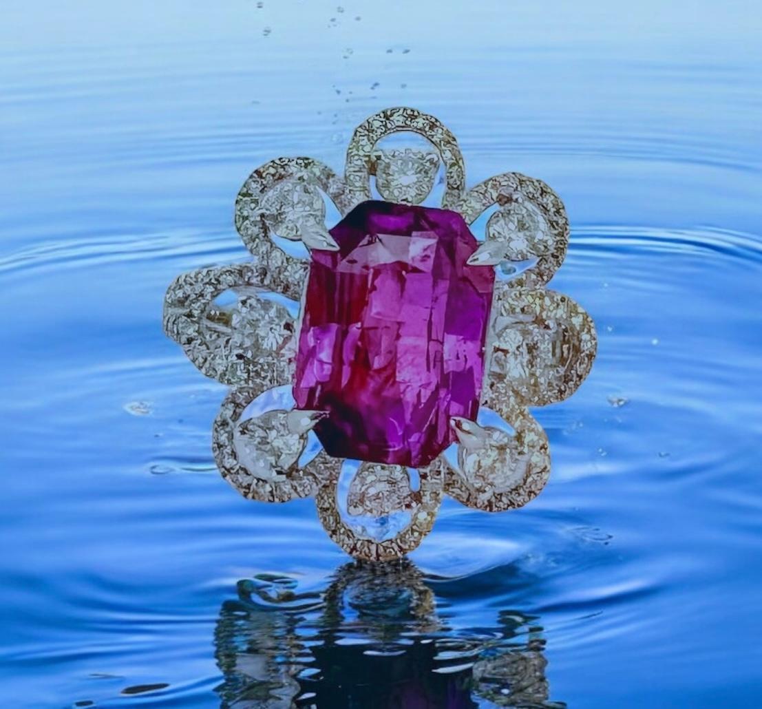 This stunning ring is a mesmerizing work of art that demands attention. The vivid purple sapphire steals the spotlight, while the intricate diamond detailing adds an extra layer of elegance.

At it's centre, sits a 4.88 ct radiant rectangle cut