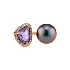 Bague en saphir violet, perle de Tahiti et diamants