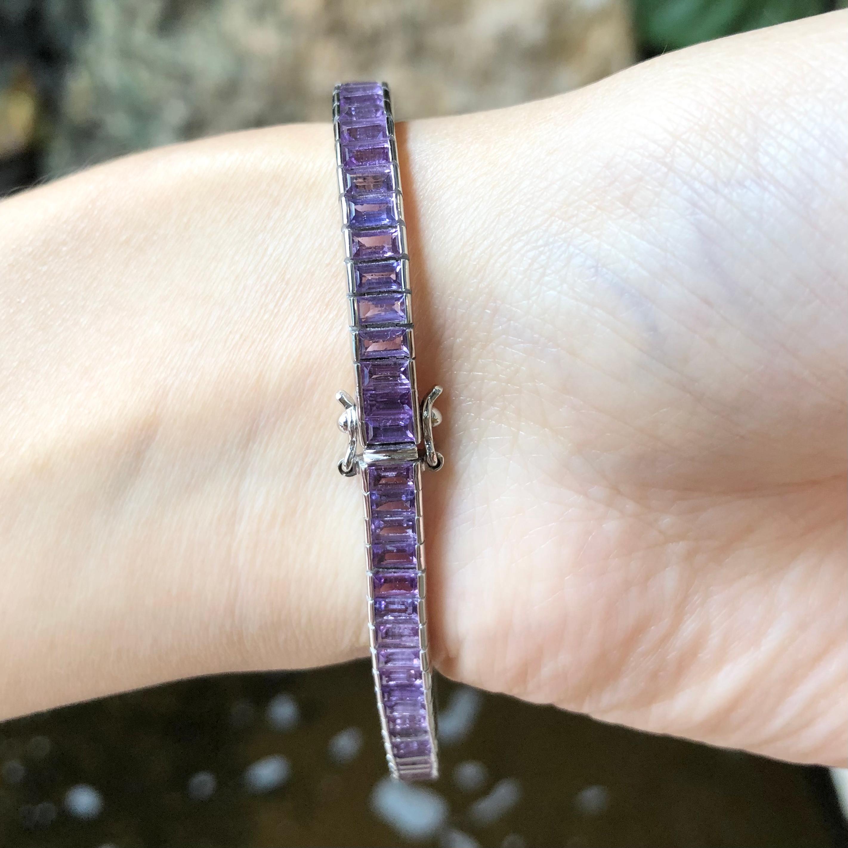 Purple Sapphire 11.50 carats Bracelet set in 18 Karat White Gold Settings

Width:  0.5 cm 
Length: 18.0 cm
Total Weight: 29.12 grams


